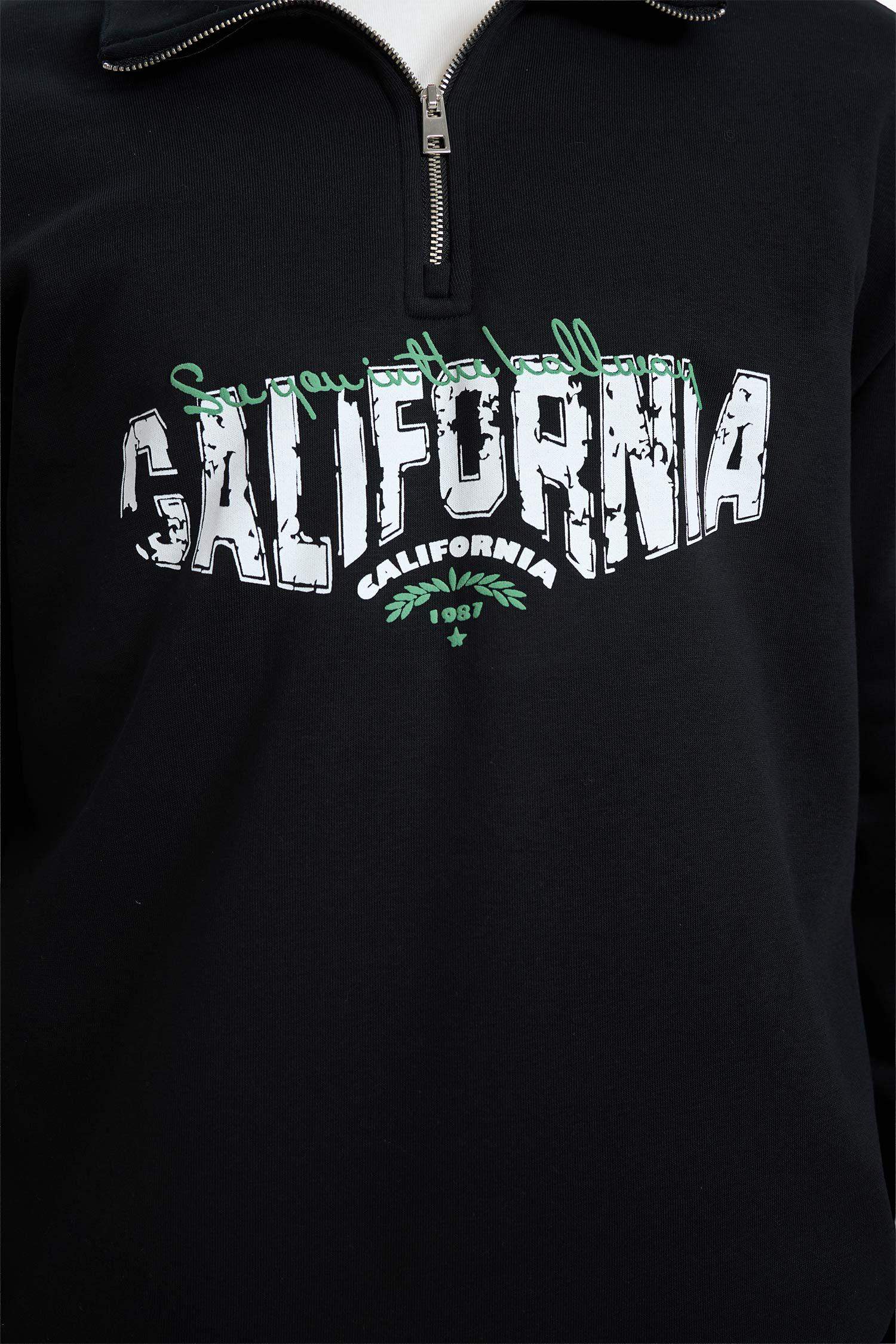 سويت شيرت أوفر سايز برقبة عالية بساق بسحاب