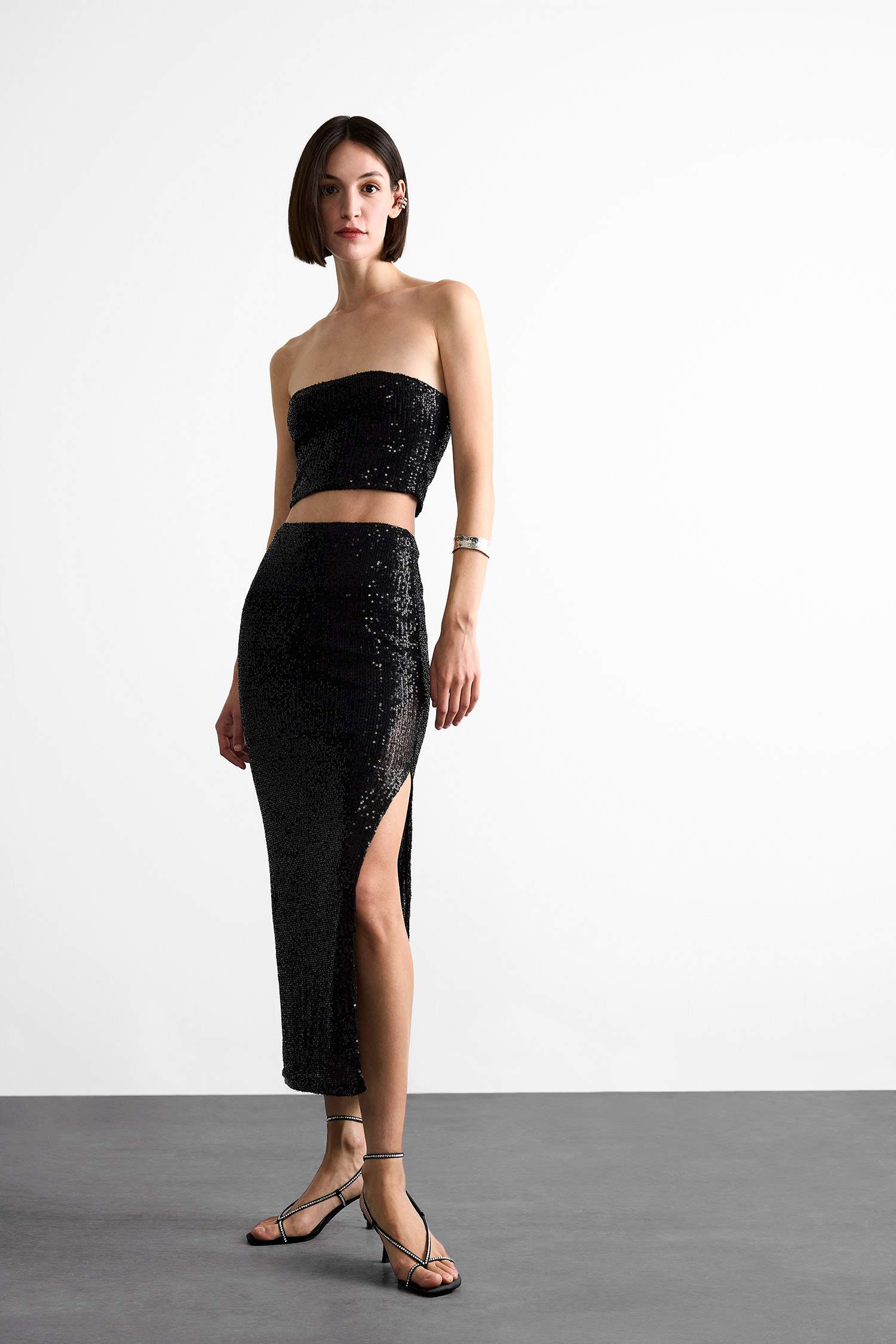 Slim Fit Dar Kesim Payetli Yırtmaçlı Midi Etek