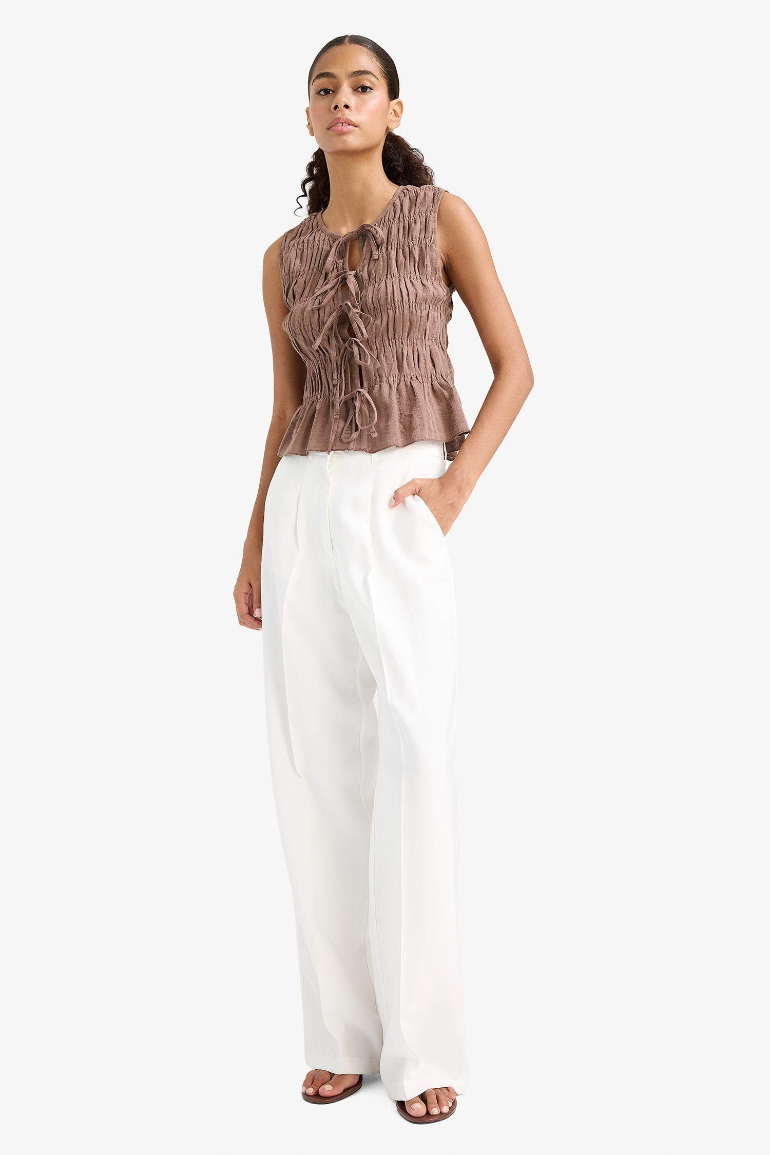 Slim Fit Crew Neck Tie Front Sleeveless Blouse