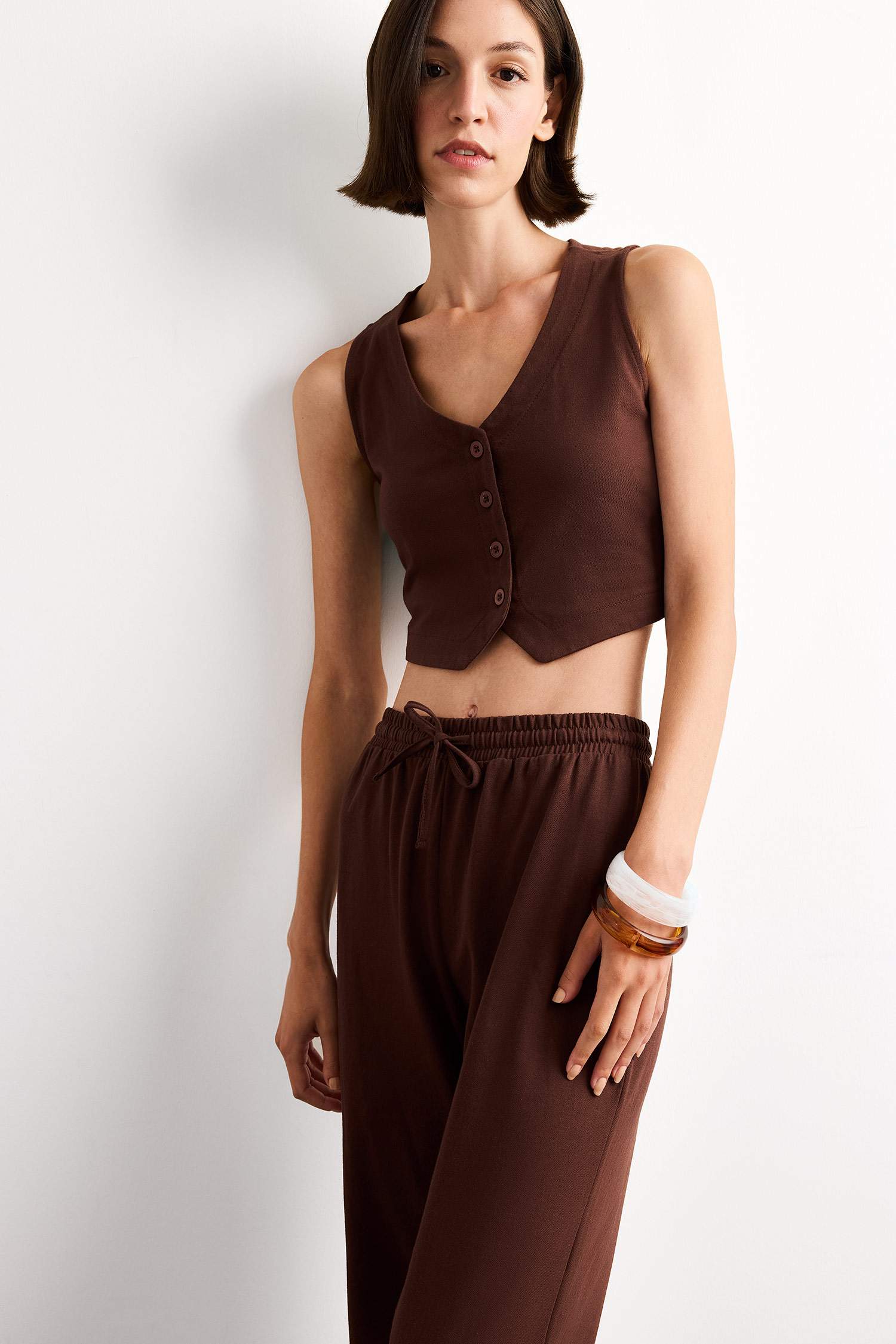 فانيلة مخصر بياقة بأزرار مخطط