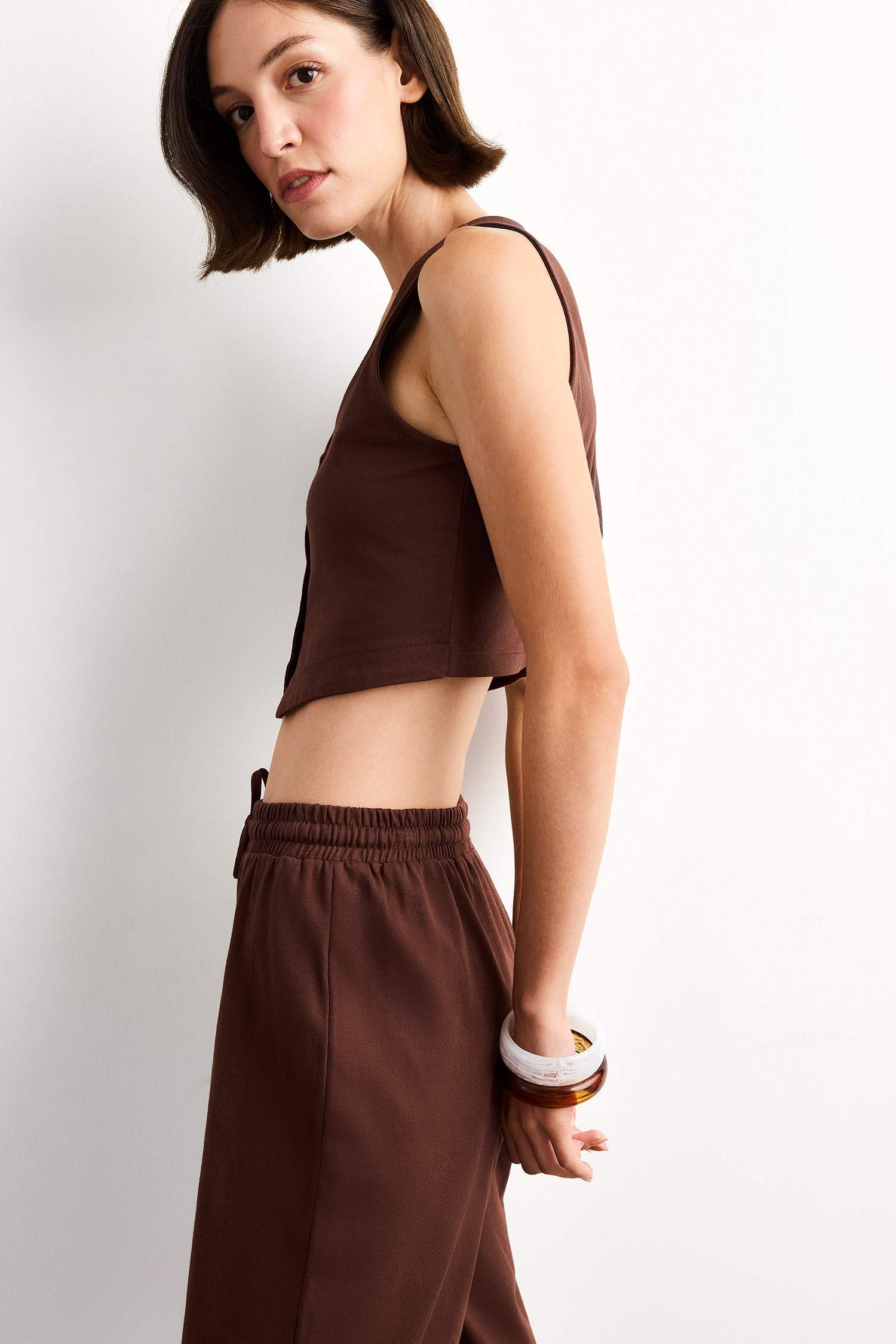 فانيلة مخصر بياقة بأزرار مخطط