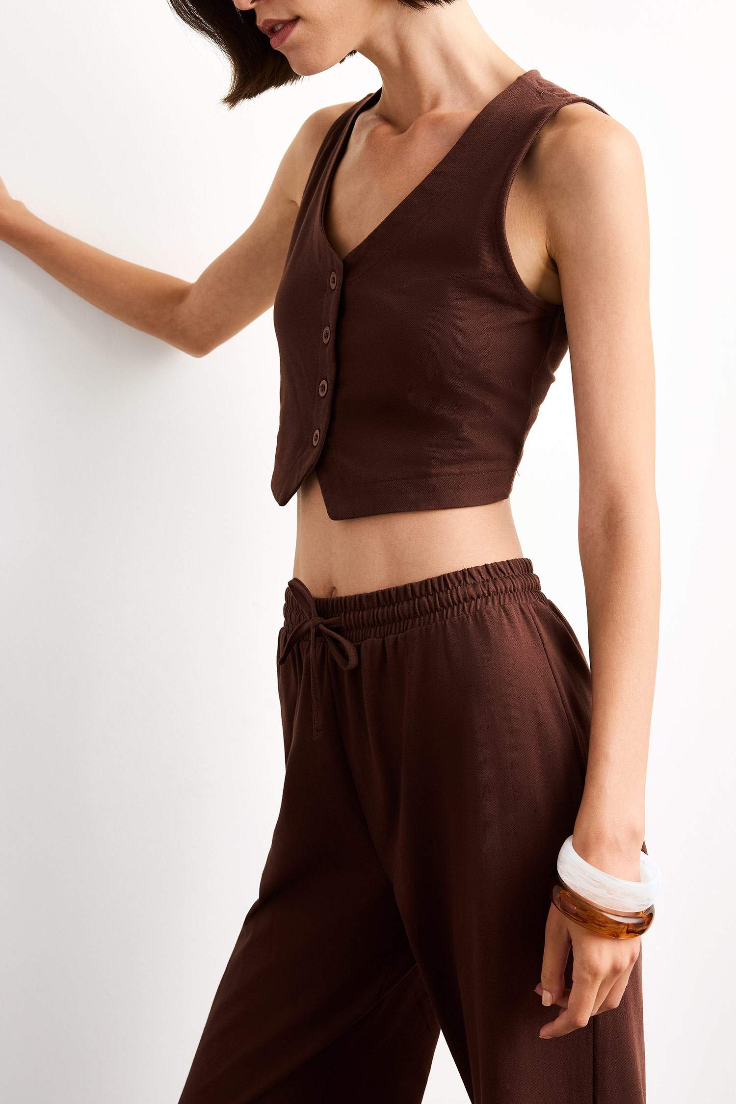 فانيلة مخصر بياقة بأزرار مخطط