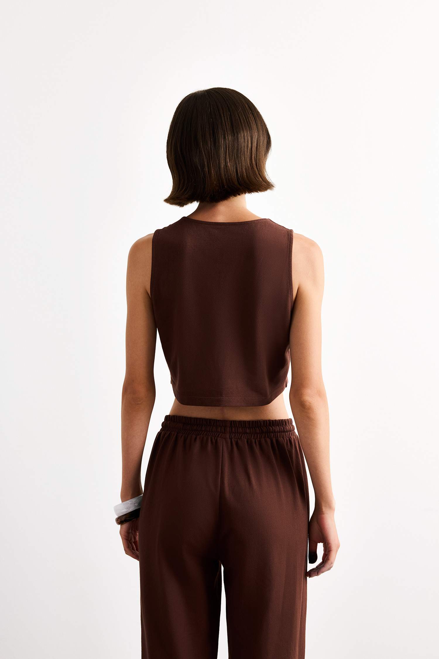 فانيلة مخصر بياقة بأزرار مخطط