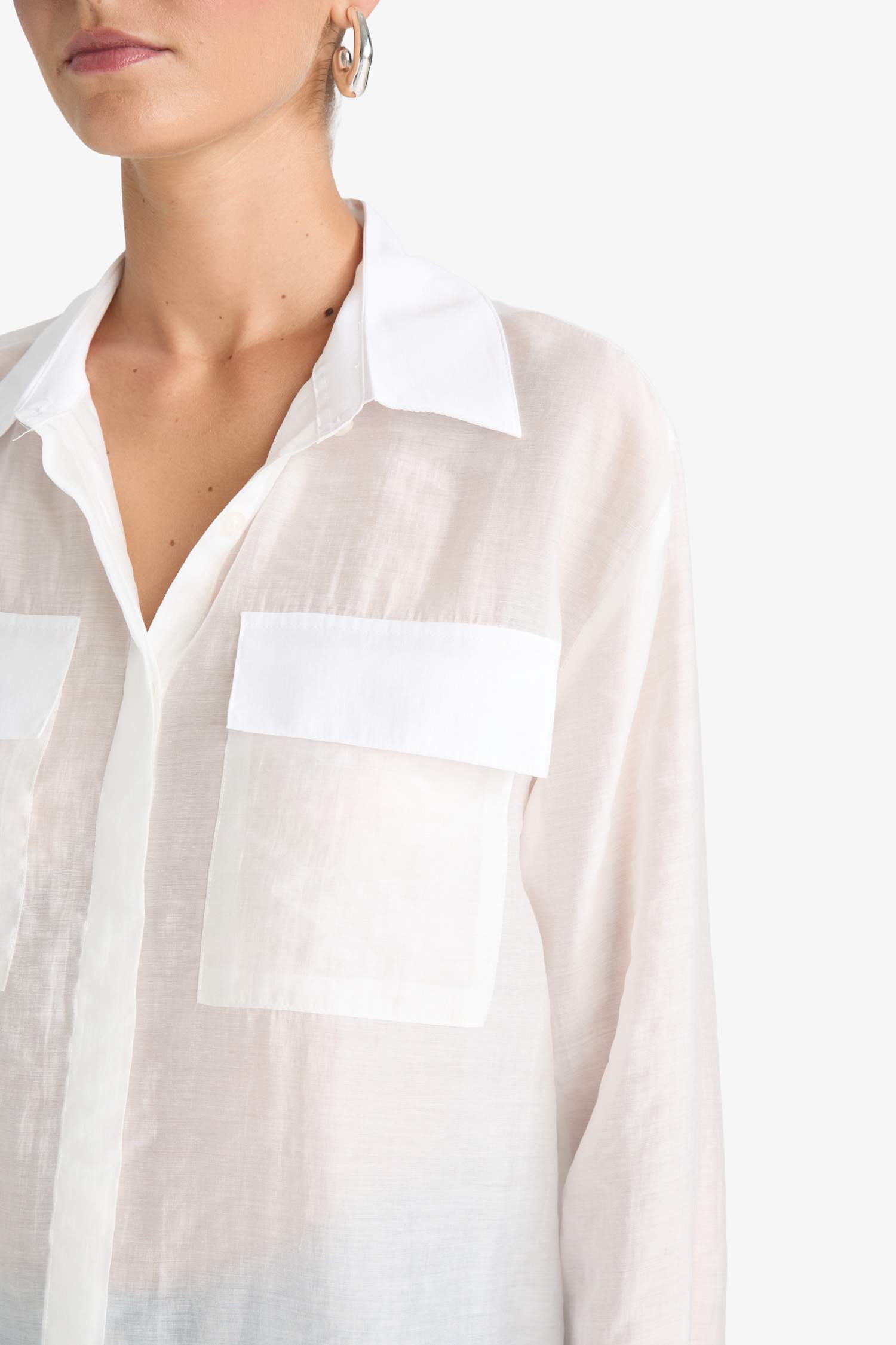 قميص كم طويل قصة عادية