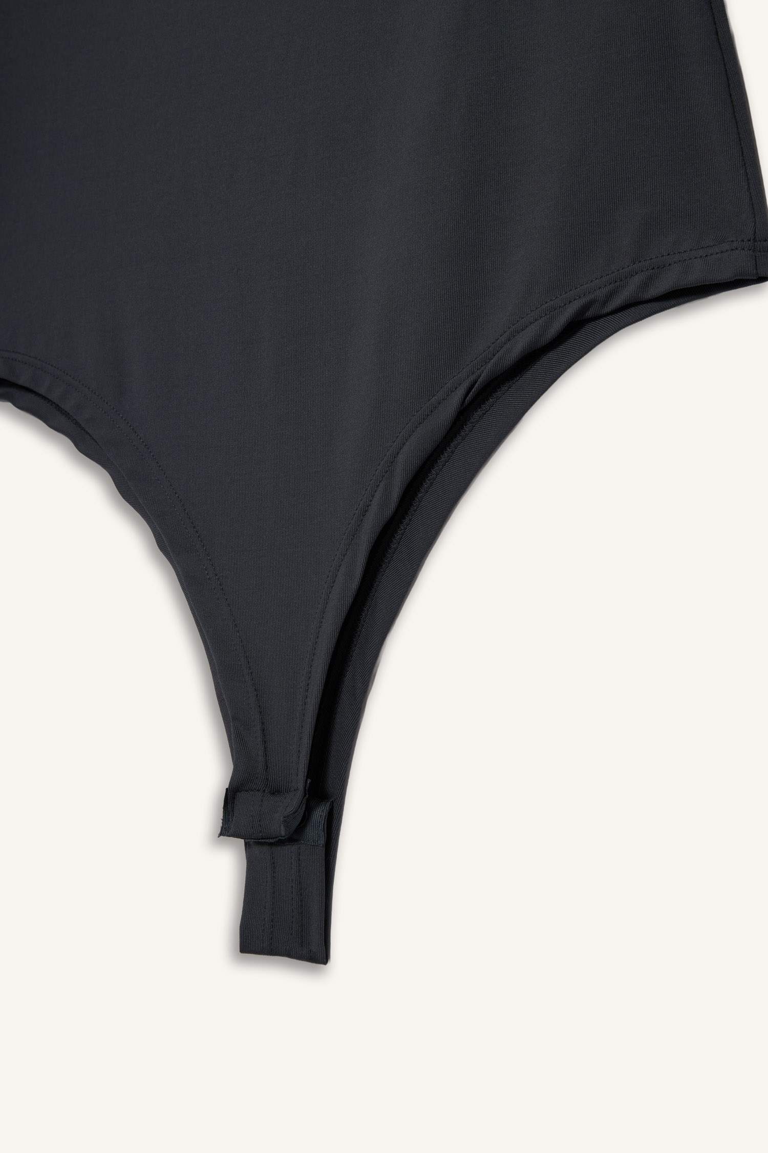 Body à manches longues et col montant à boutons-pression