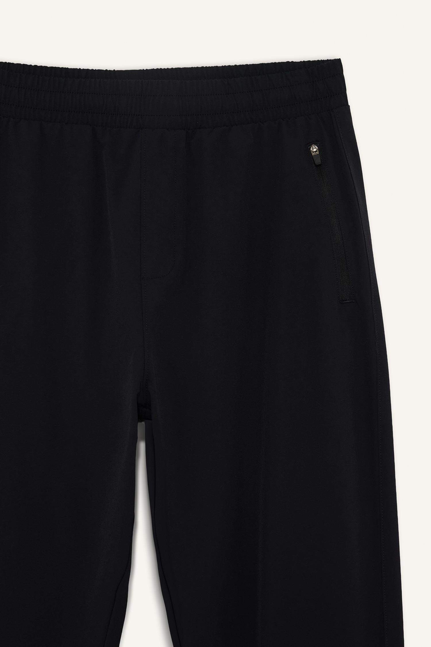 سروال رياضي منسوج سليم فيت