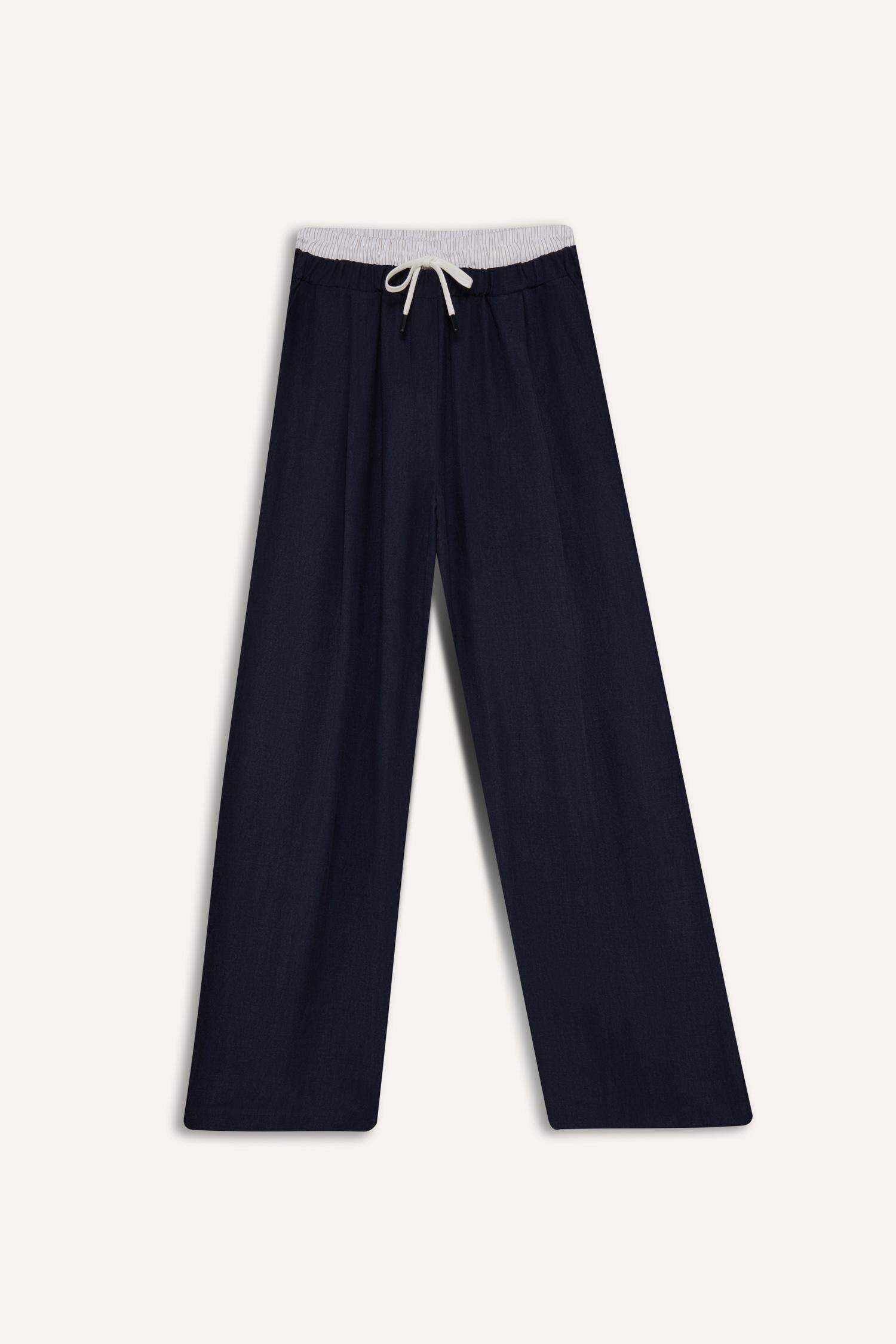 بنطرون باجي فيت قماش ايوسل بجيب وخصر عادي