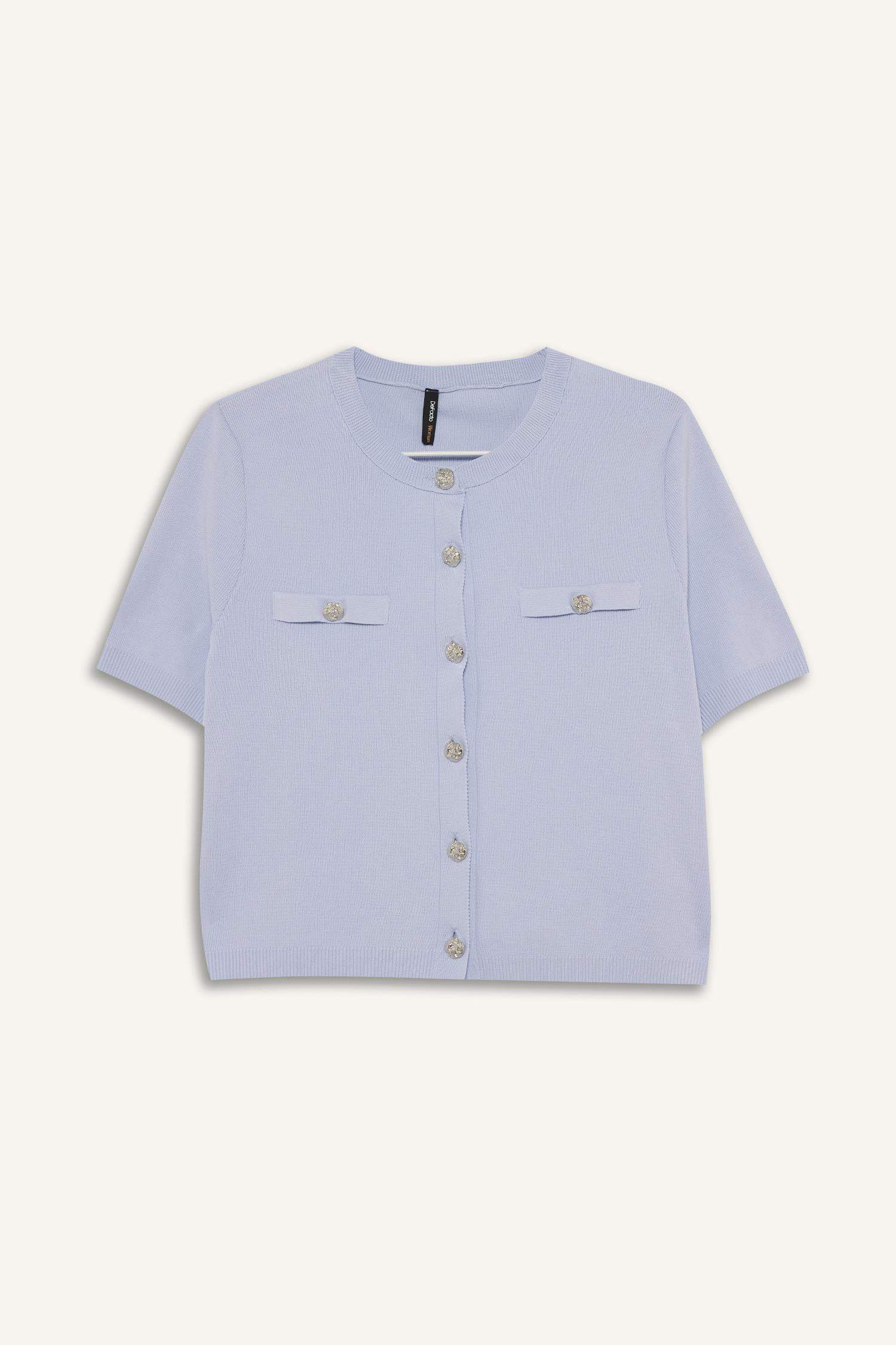 جاكيت تريكو قصة عادية بياقة مستديرة