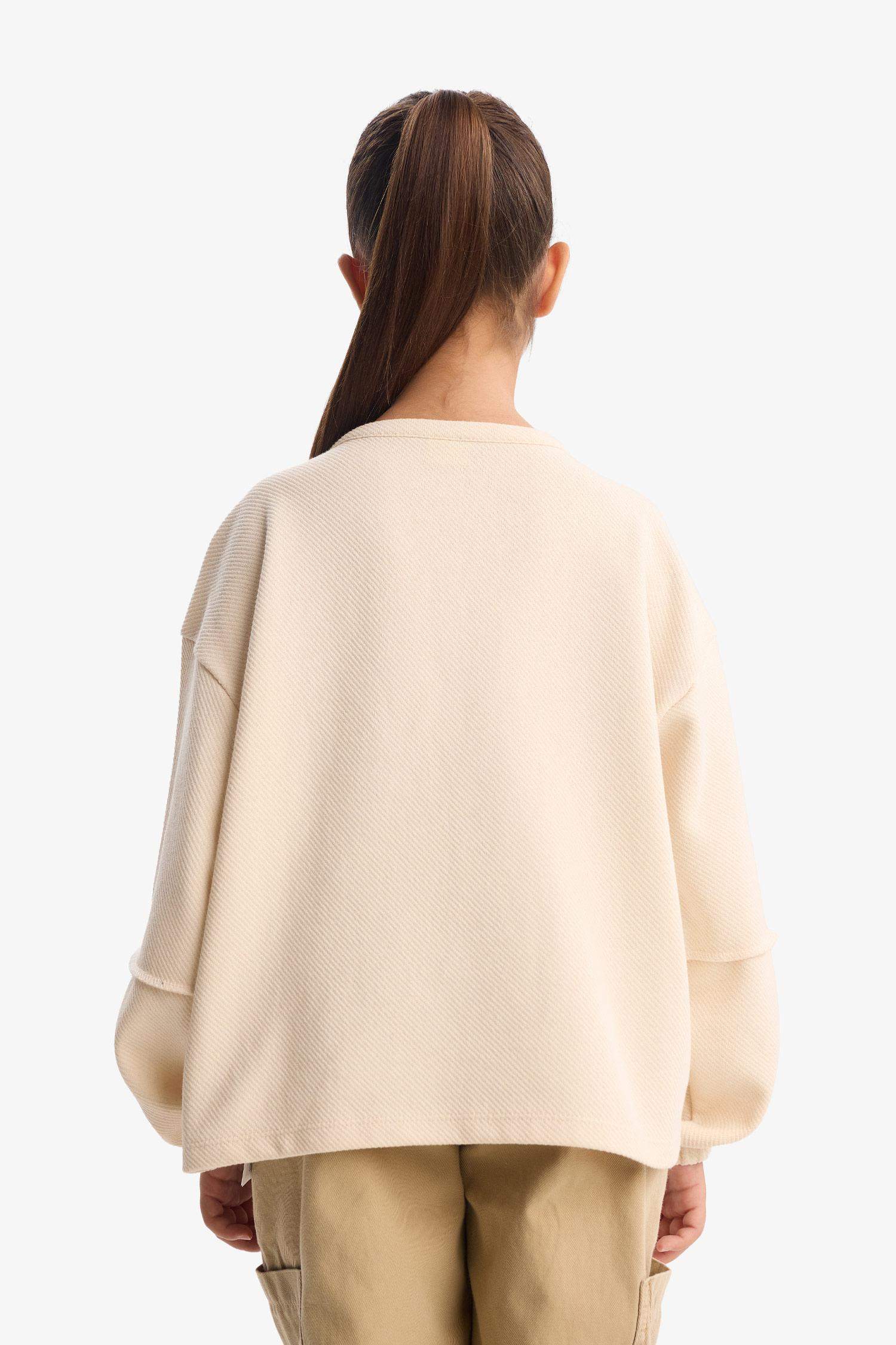 سويت شيرت بناتي اوفر سايز بياخة V