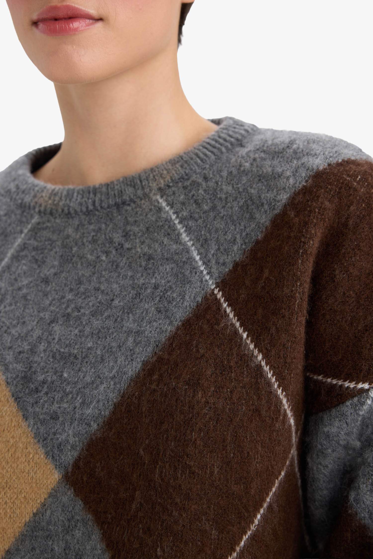 بلوز تريكو قصة مريحة بياقة مستديرة