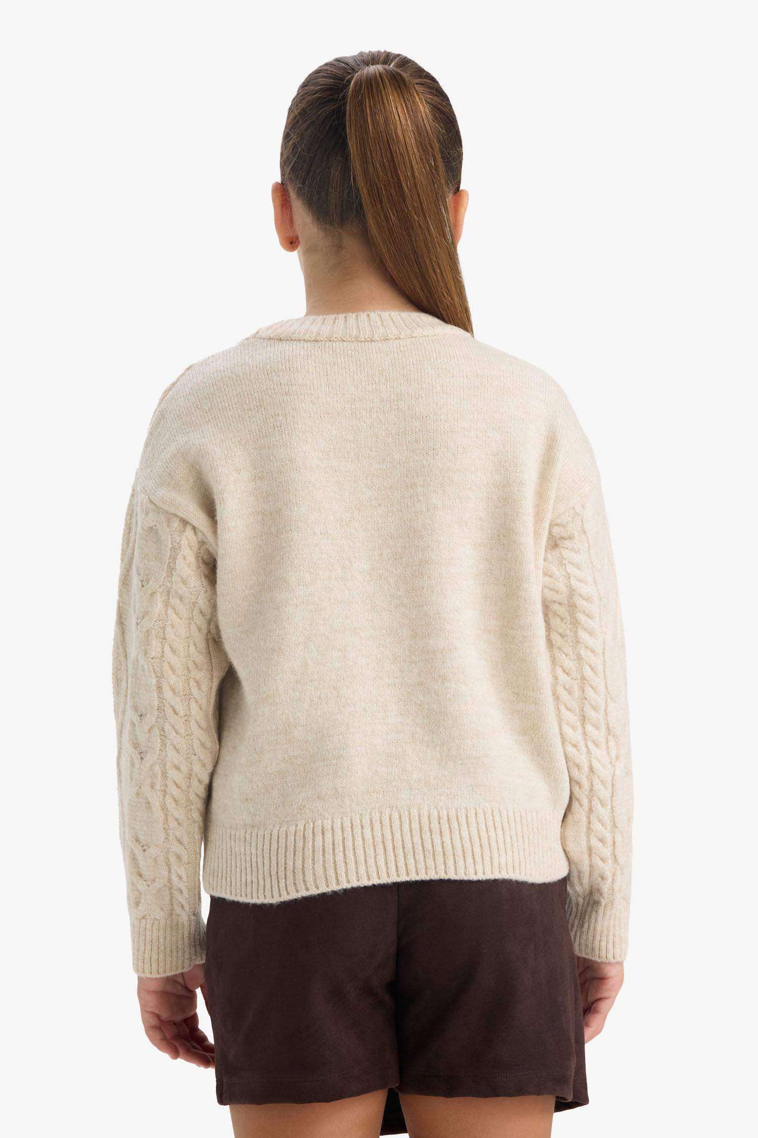 بلوفر تريكو بناتي قصة فضفاضة بياخة مستديرة