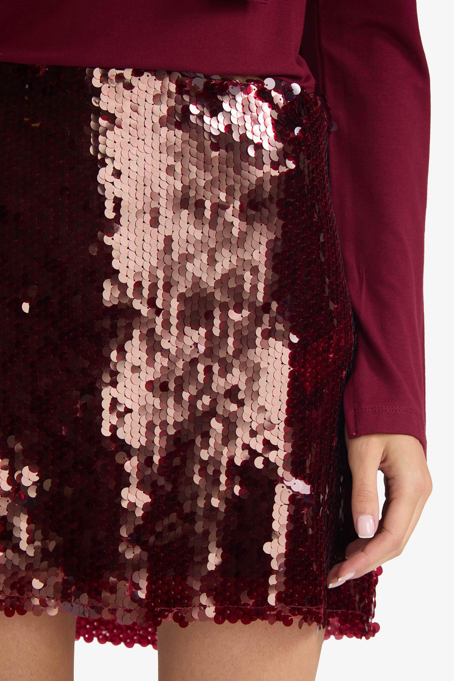 تنورة قصيرة بالترتر خصر عادي