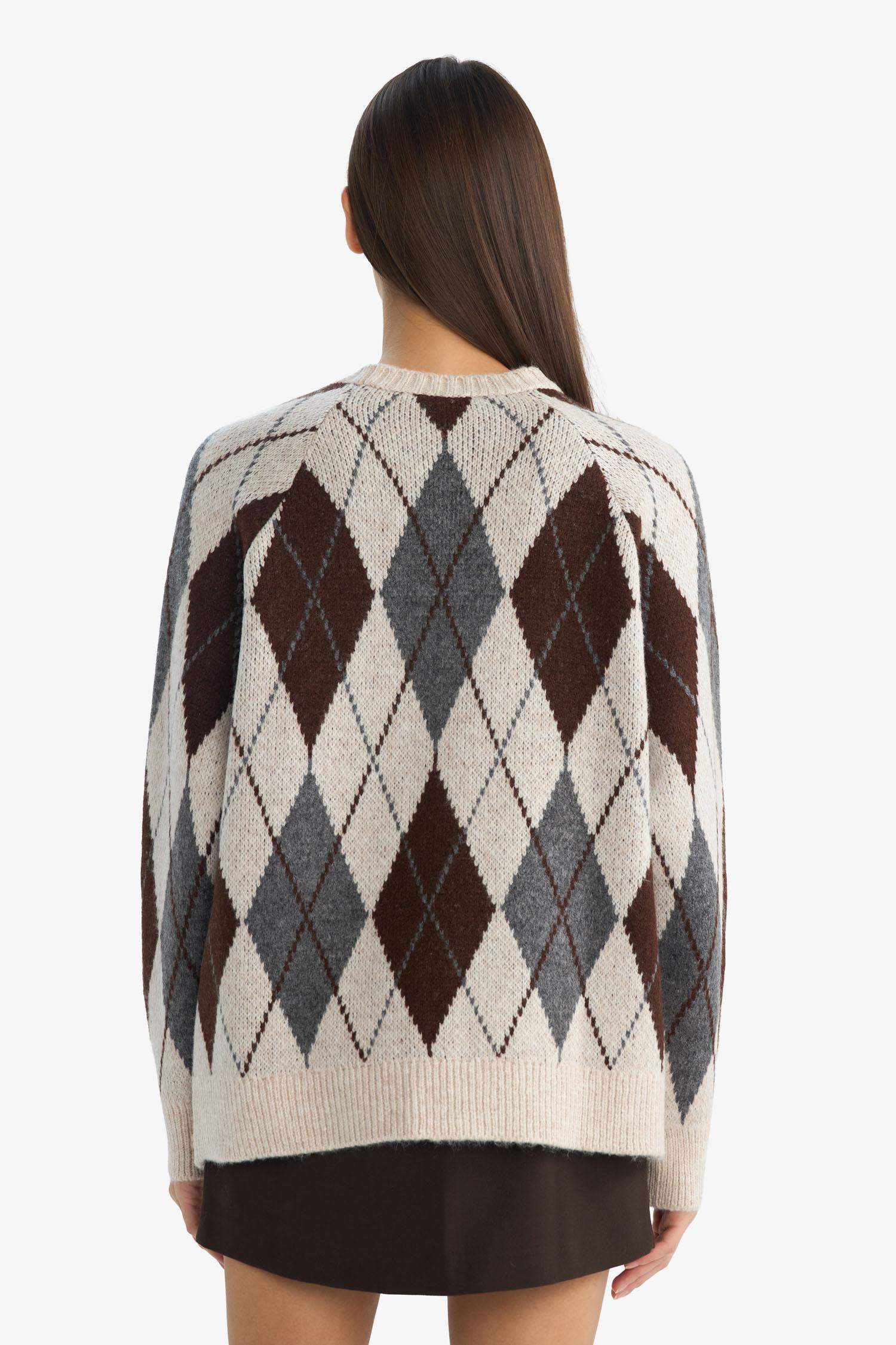 بلوز تريكو اوفر سايز بياخة مستديرة