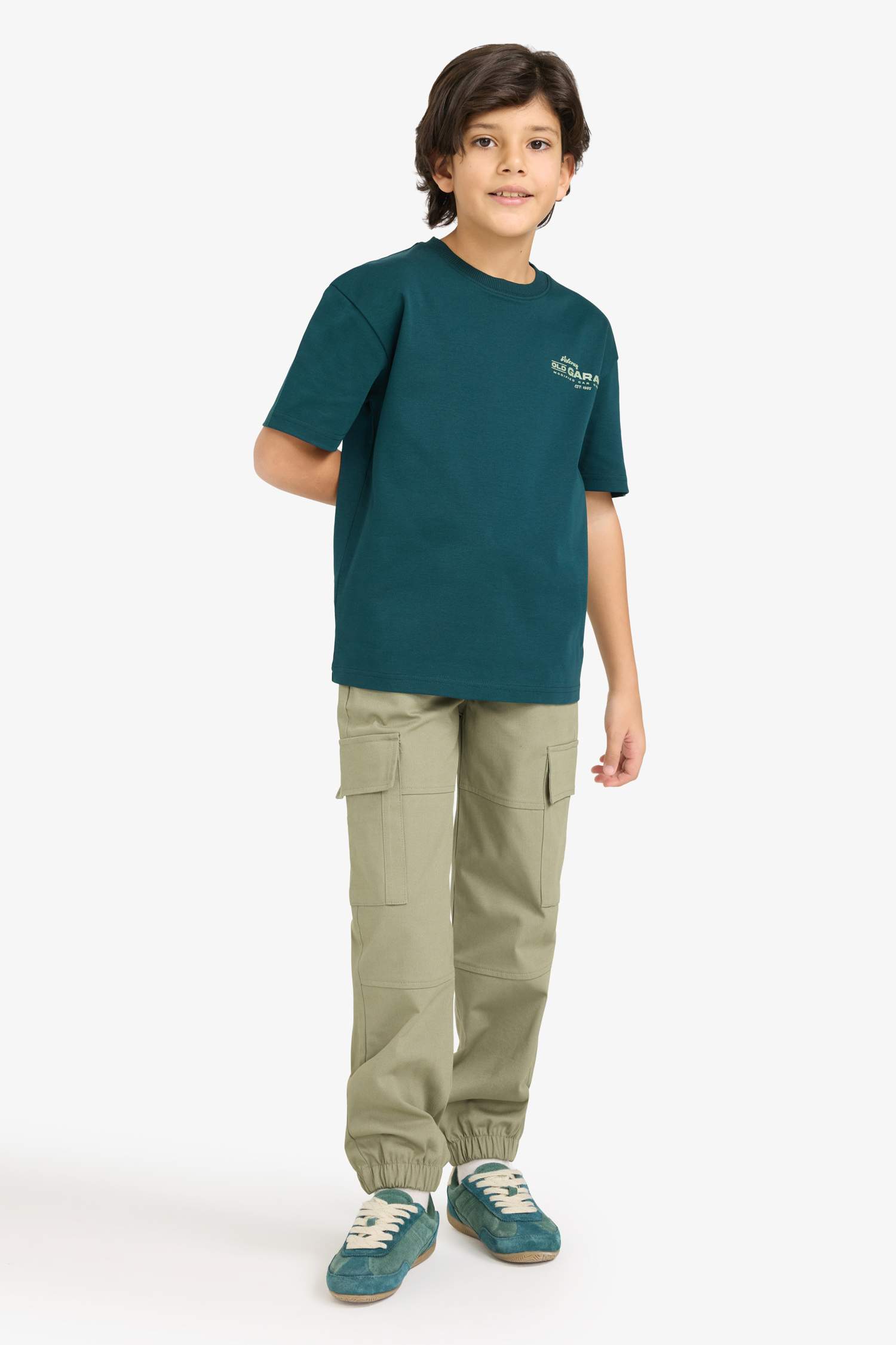 تيشيرت ولادي نص ردن بطبعة شعار اوفر سايز بياخة مستديرة