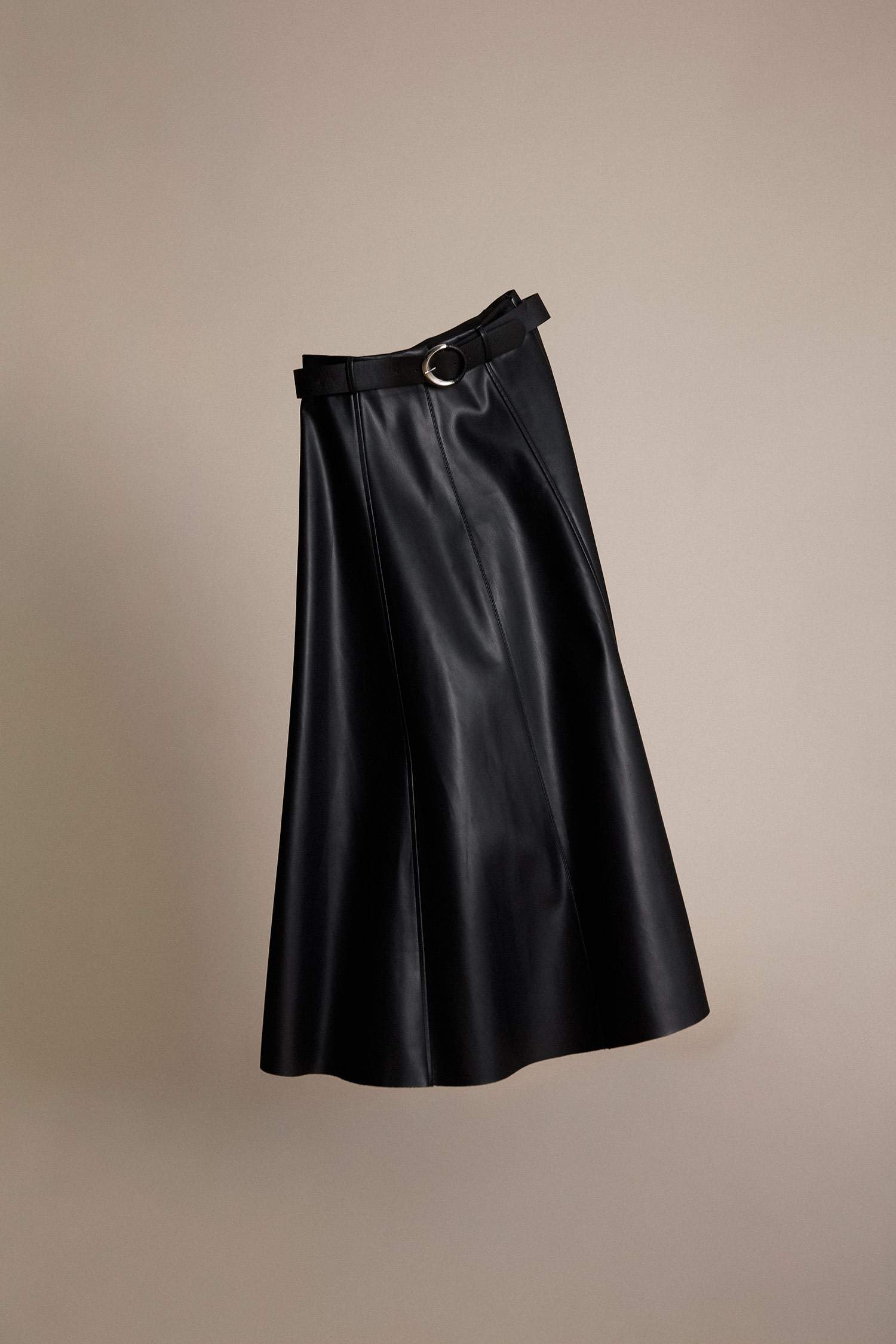 A Cut Faux Leather Knitted Skirt