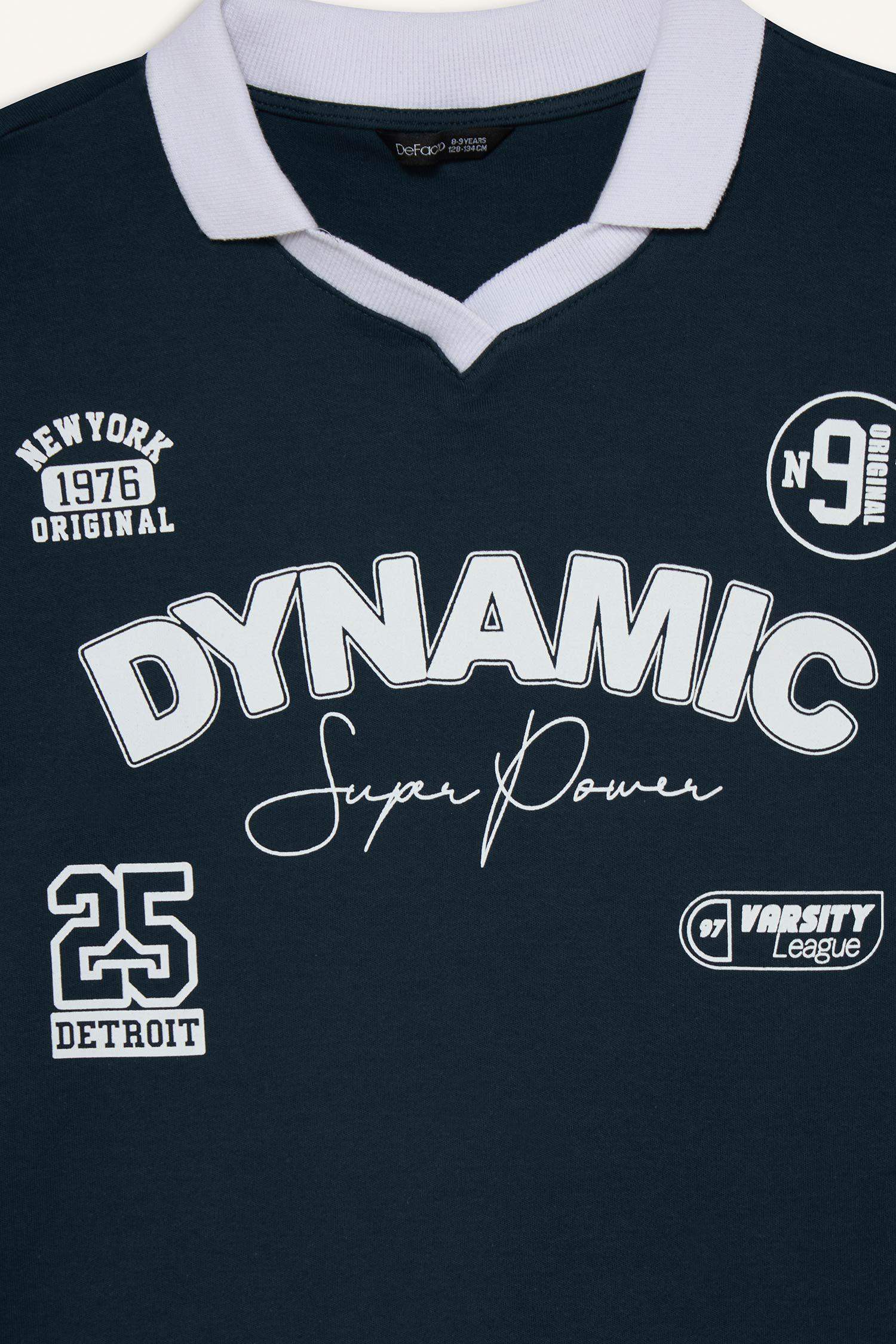 تيشيرت بولو نص ردن بطبعة شعار اوفر سايز وياخة عالية