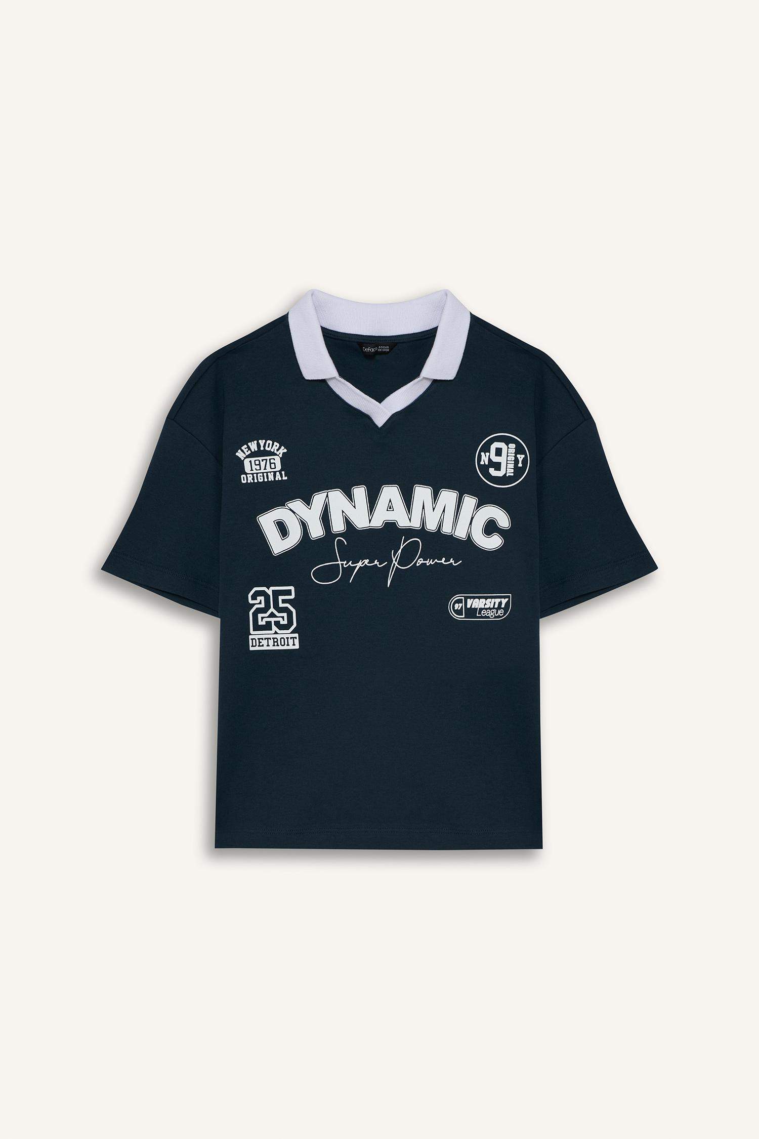 تيشيرت بولو نص ردن بطبعة شعار اوفر سايز وياخة عالية