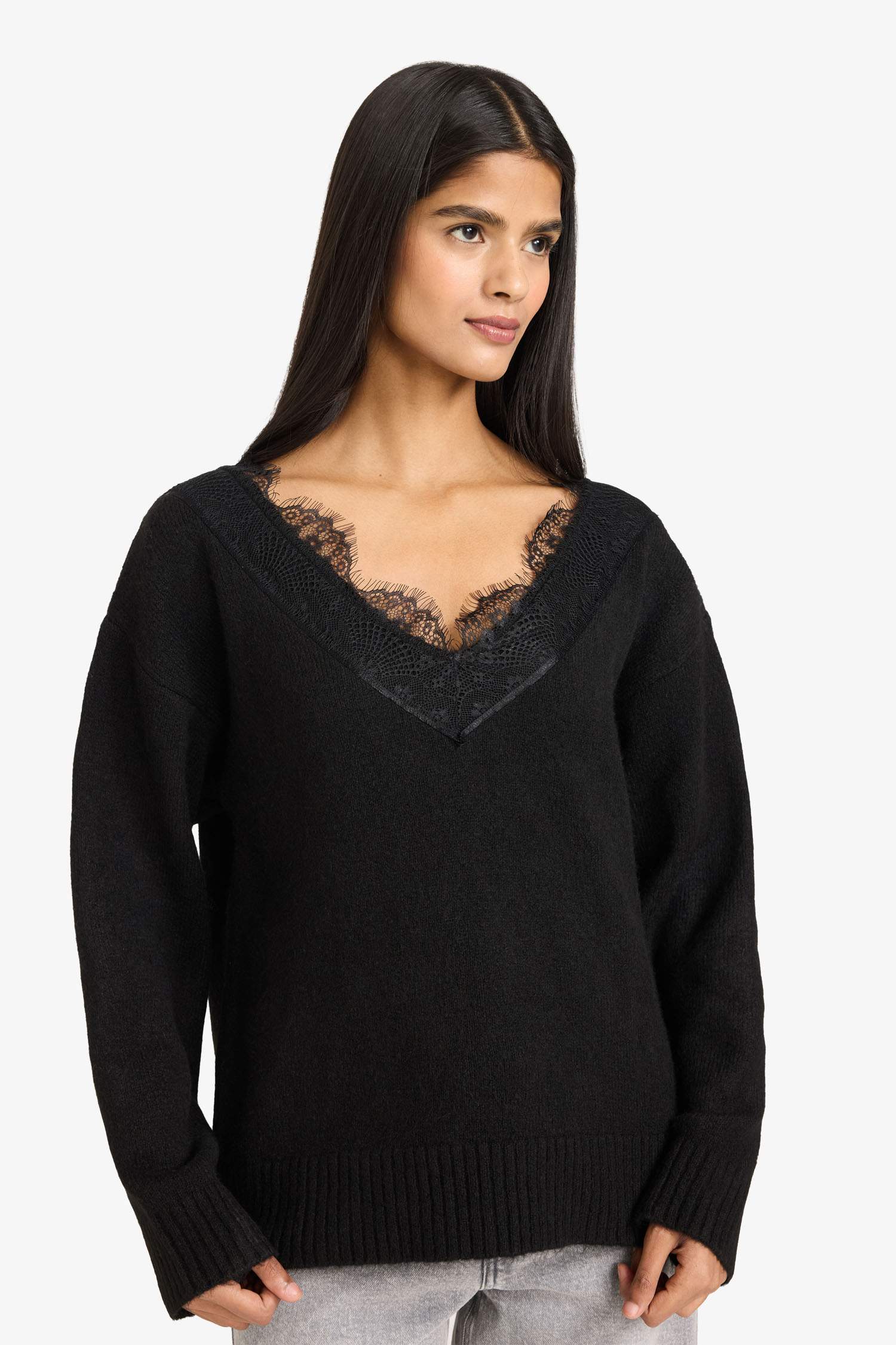 بلوز صوف مخطط قصة عادية بياخة مستديرة بأزرار