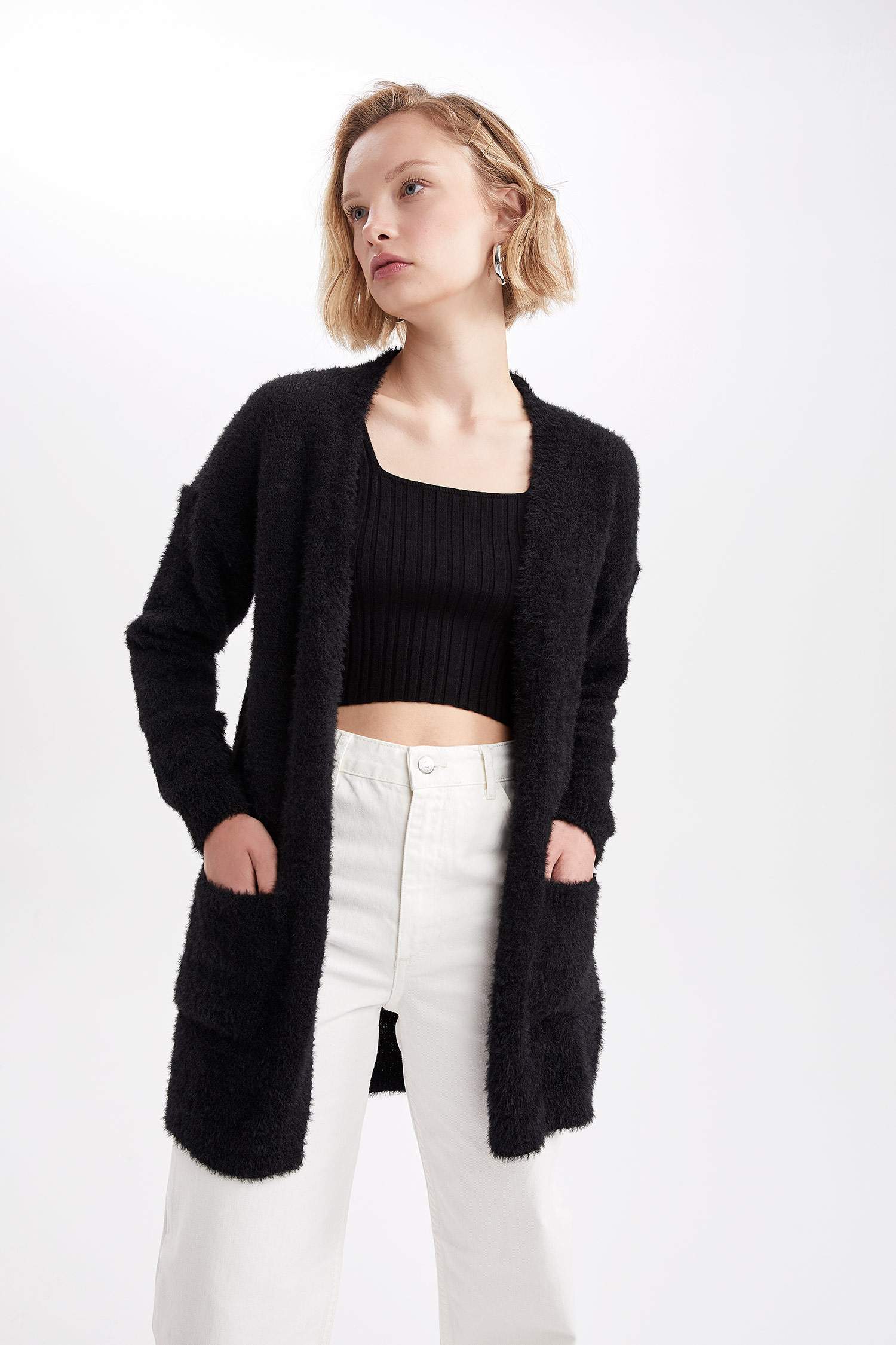 سويترتريكو بقصة عادية بكتف نازل مفصل بجيب