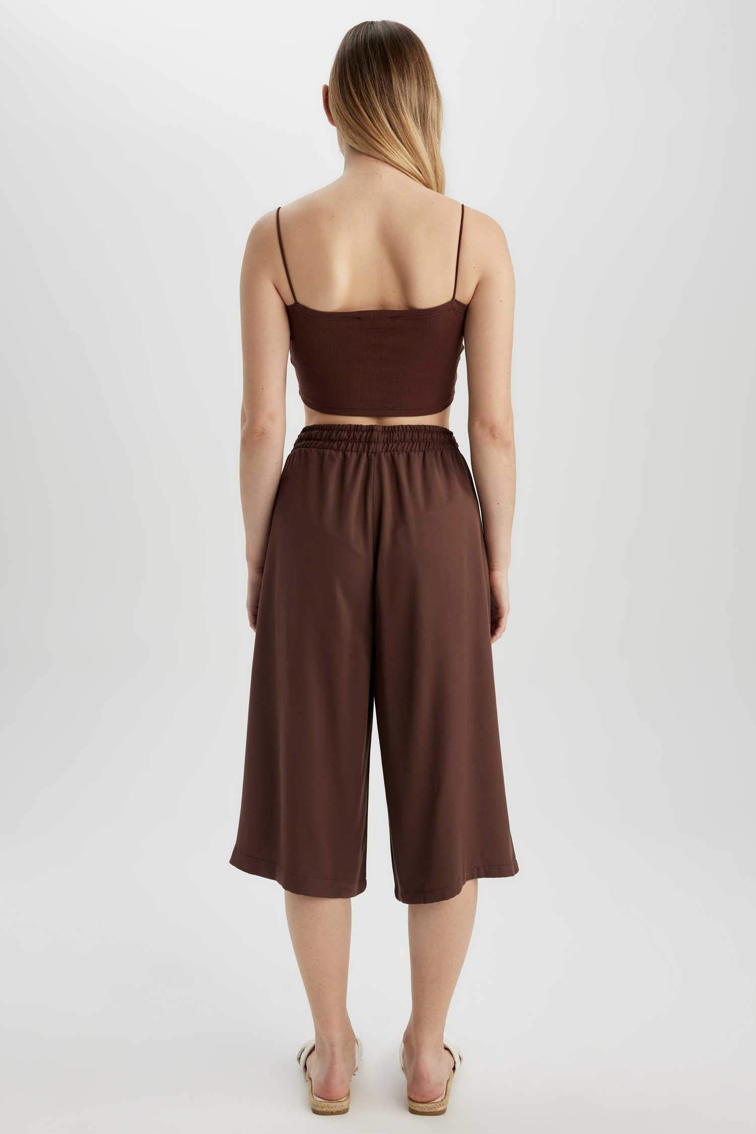 Paz Torras shop online | Light brown capri palazzo trousers with belt