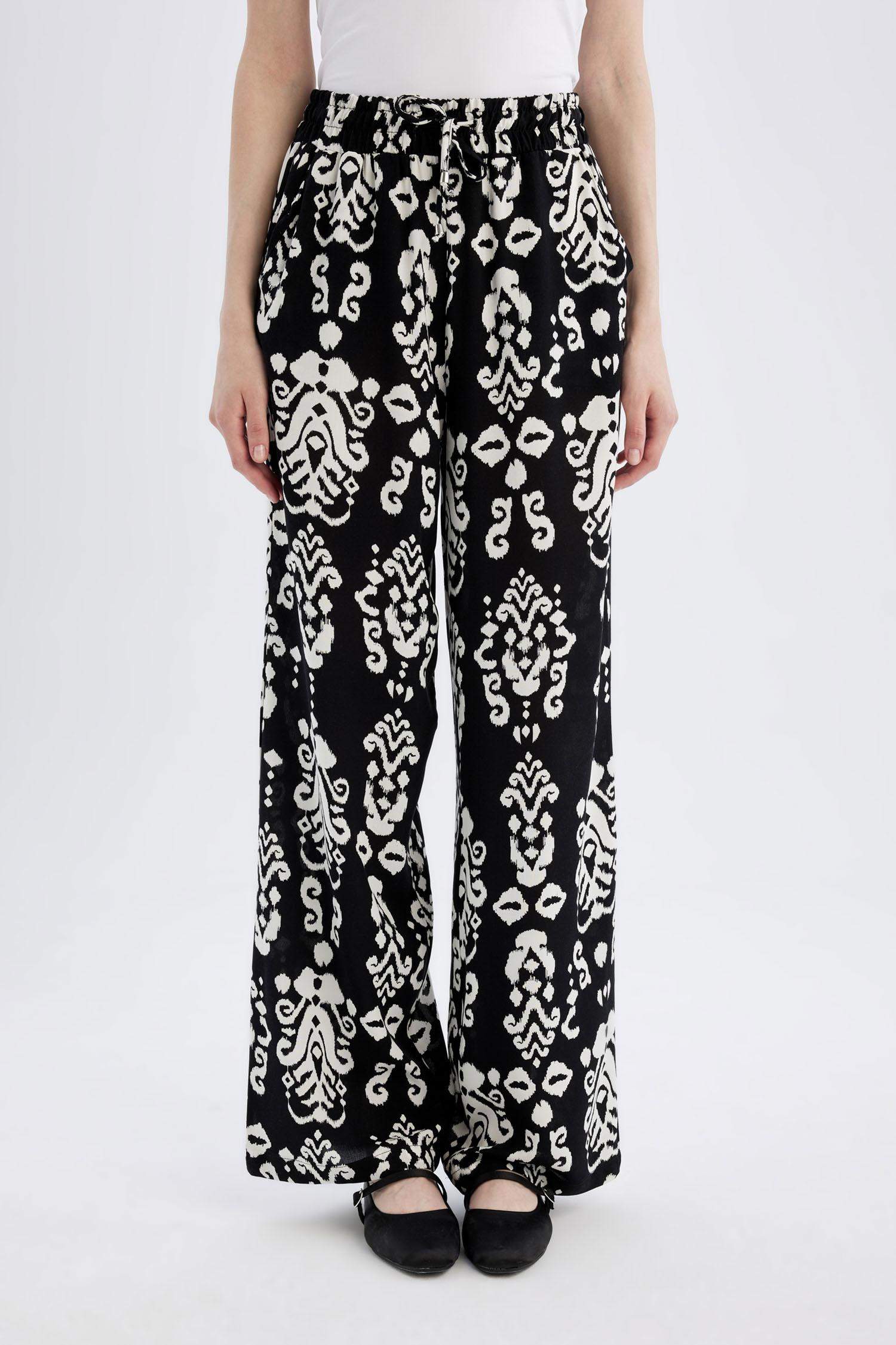 بنطرون فلورايدا وايد ليج برجل واسع بجيب وخصر عالي