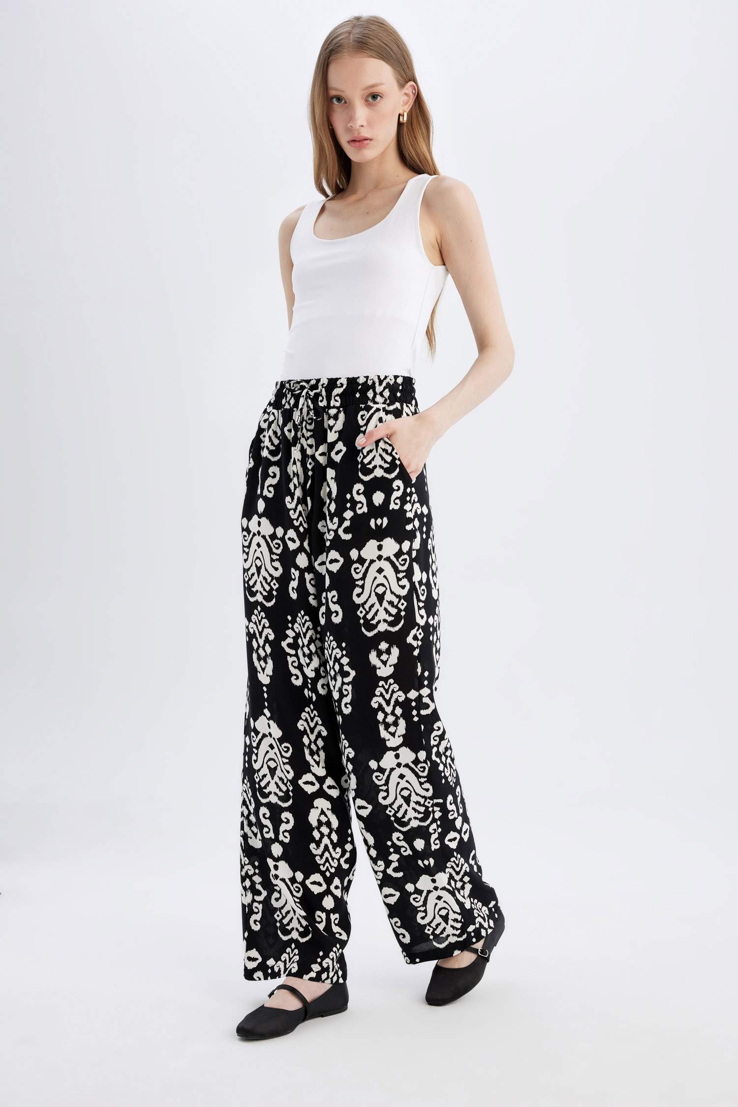 بنطرون فلورايدا وايد ليج برجل واسع بجيب وخصر عالي