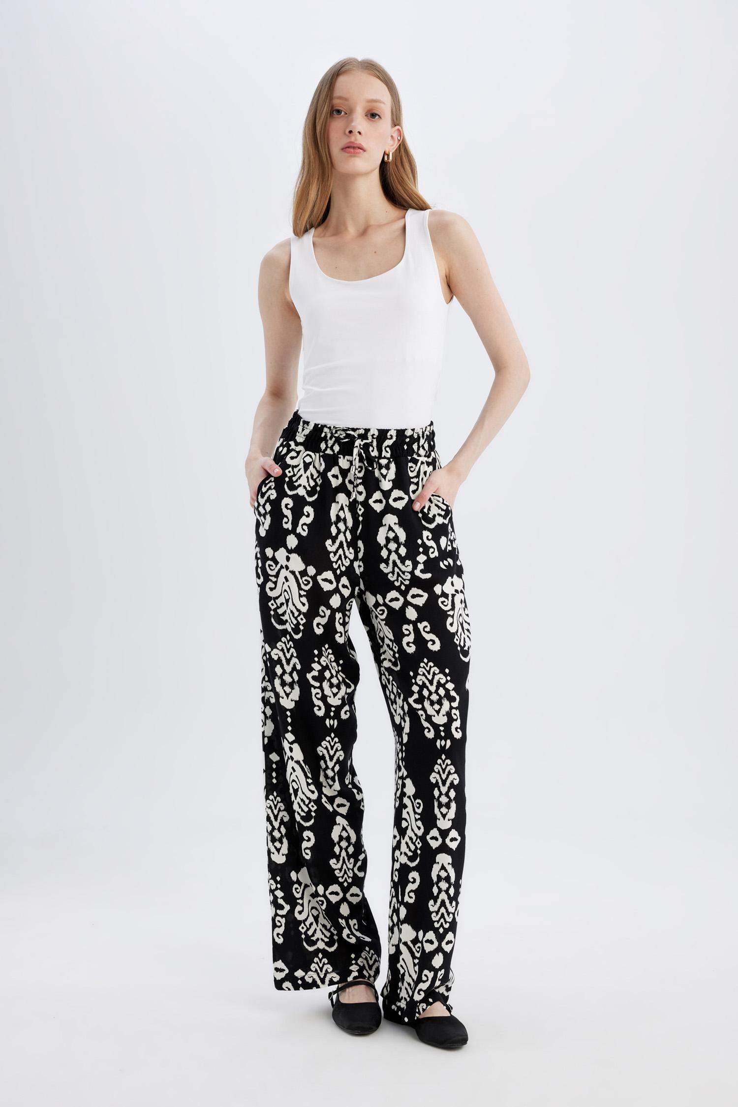 بنطرون فلورايدا وايد ليج برجل واسع بجيب وخصر عالي