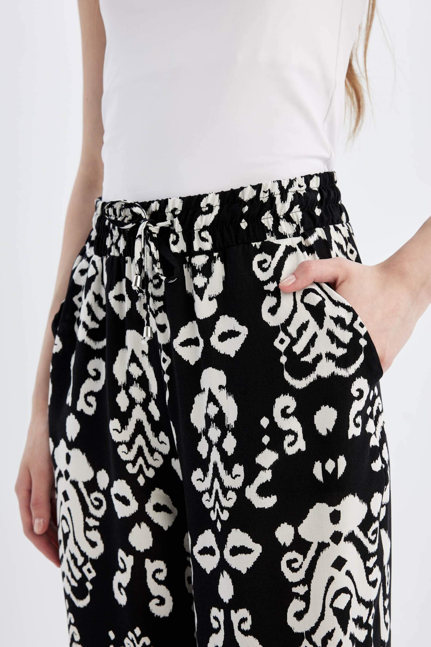 بنطرون فلورايدا وايد ليج برجل واسع بجيب وخصر عالي