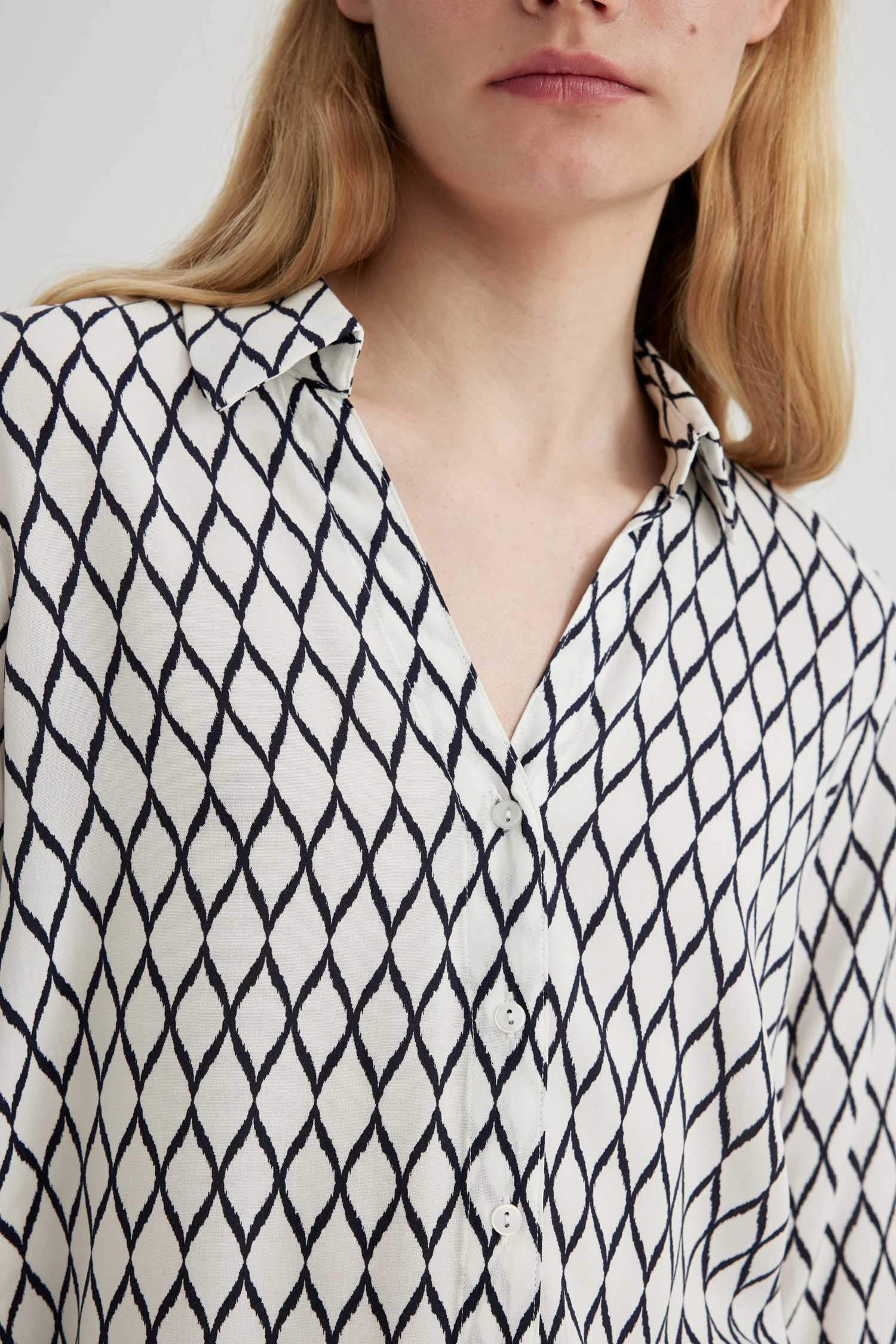 قميص ردن طويل منقوش قصة عادية