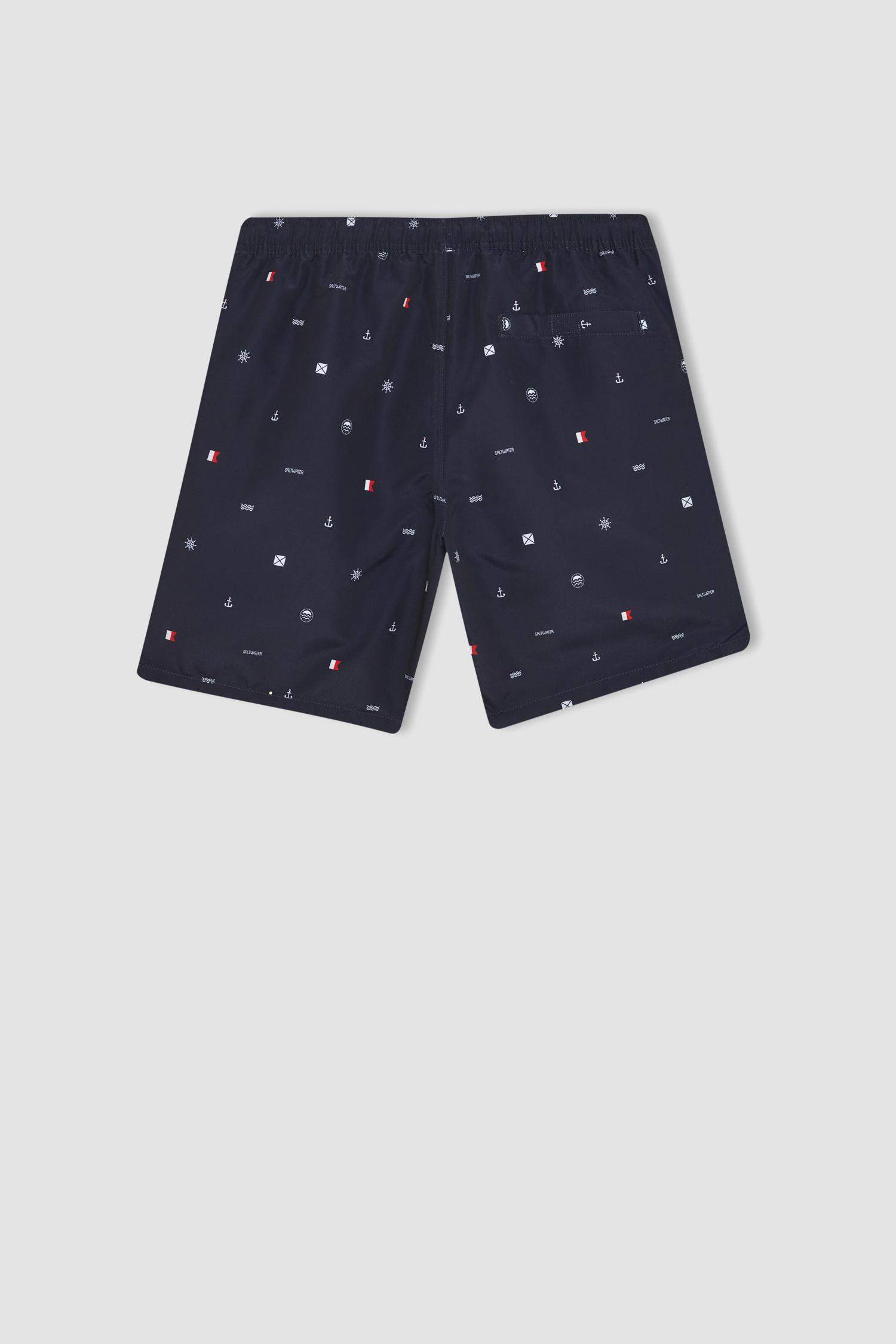 Short de bain à coupe régulière, doublé de filet et à motifs