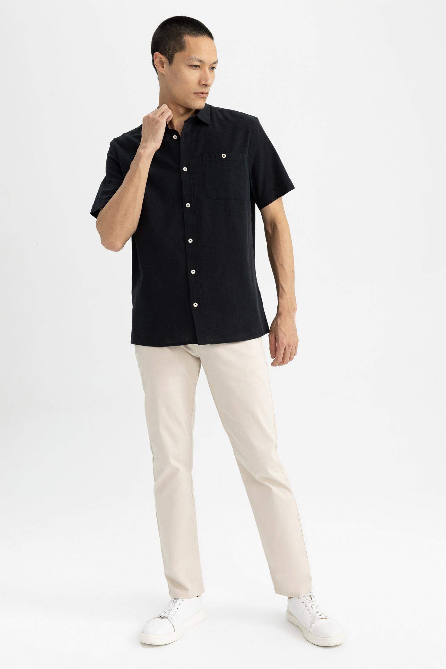 Chemise à col polo et manches courtes 100% coton