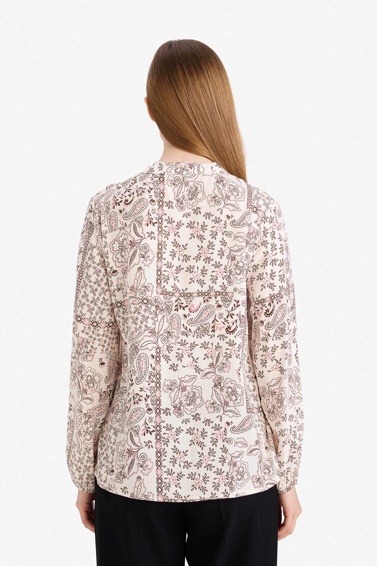 بلوزة ردن طويل قصة عادية بياخة مستديرة