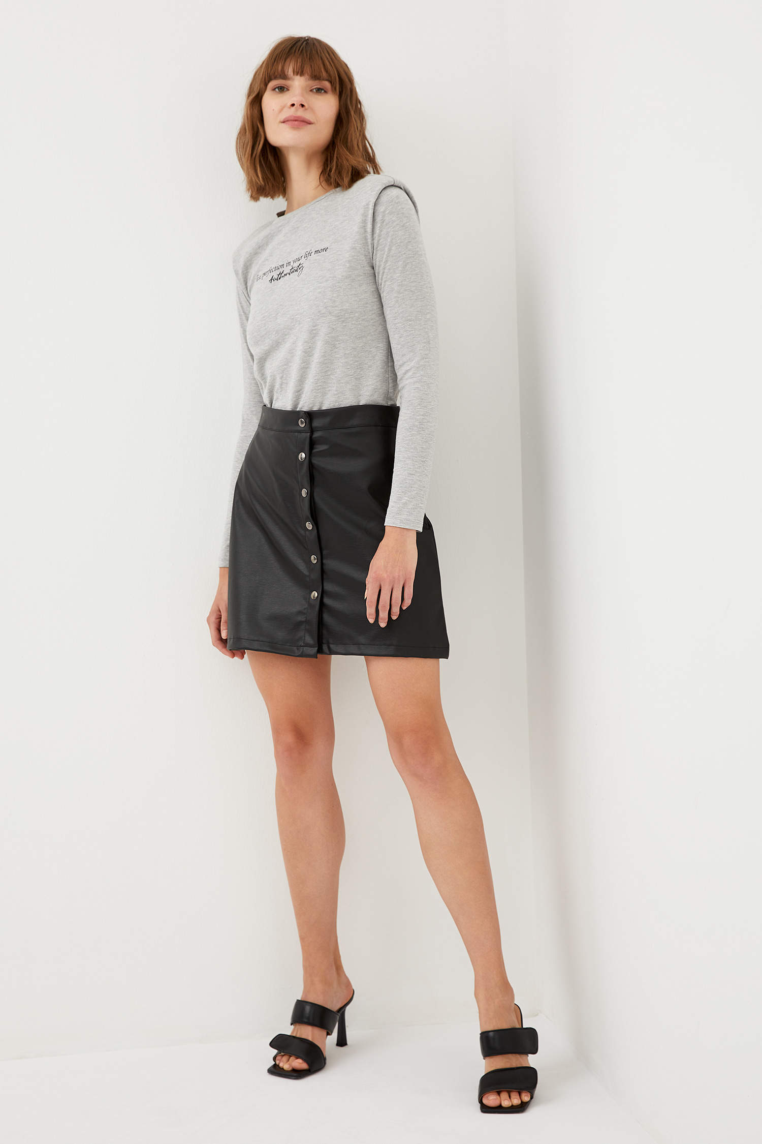 Black WOMAN Faux Leather Buttoned Mini Skirt 1502886 | DeFacto