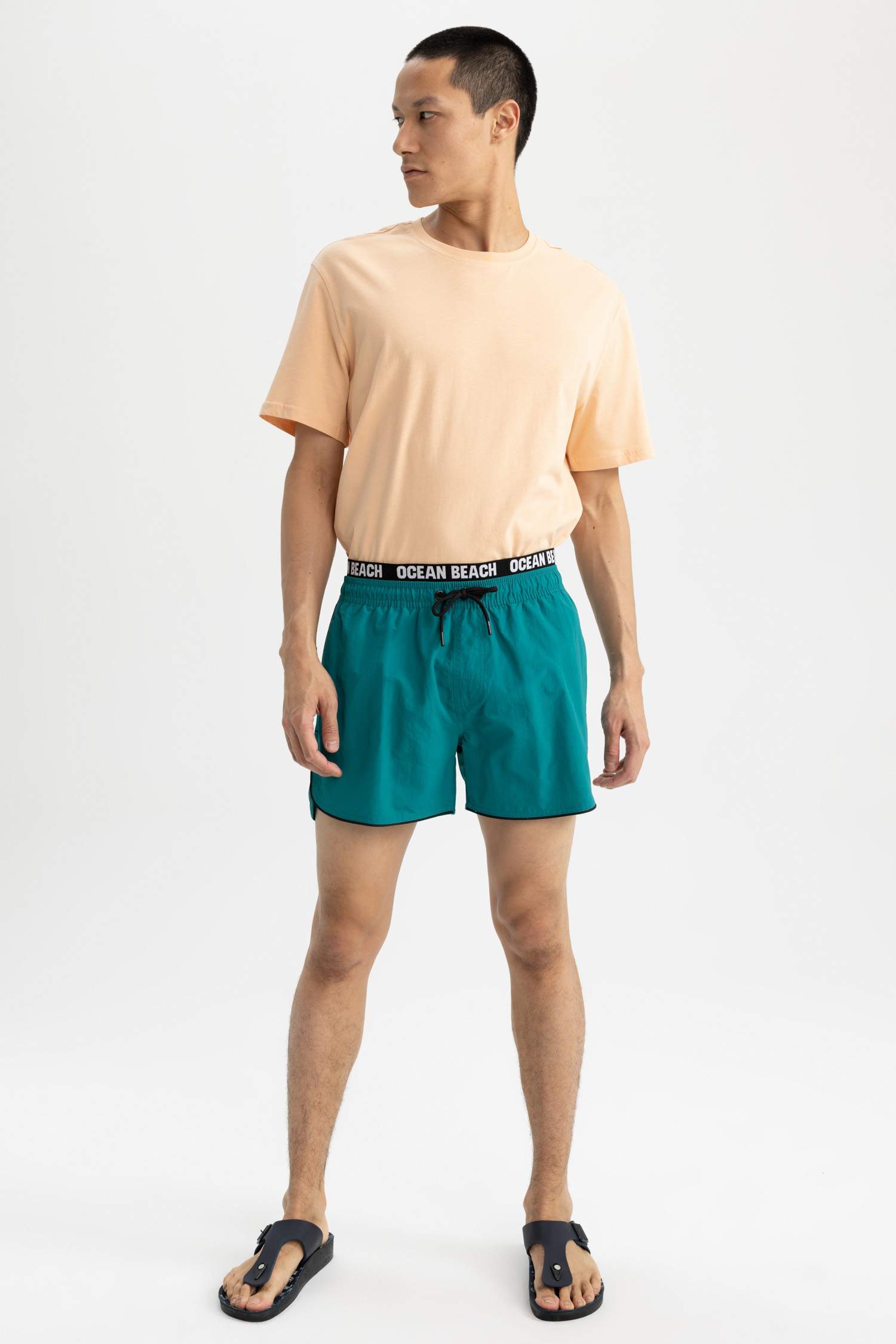 Тоқымалы жүзу шолақ шалбар энди басып шығарылған өте қысқа ұзындық