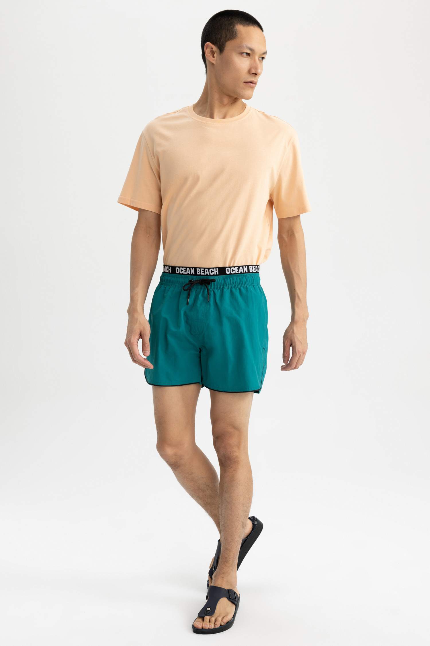 Тоқымалы жүзу шолақ шалбар энди басып шығарылған өте қысқа ұзындық