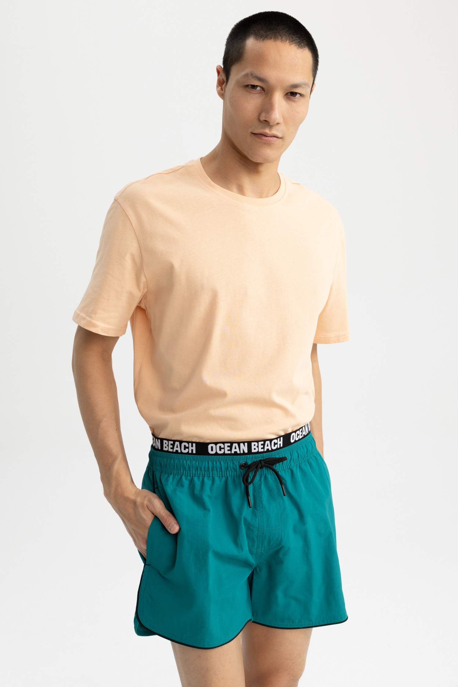 Тоқымалы жүзу шолақ шалбар энди басып шығарылған өте қысқа ұзындық