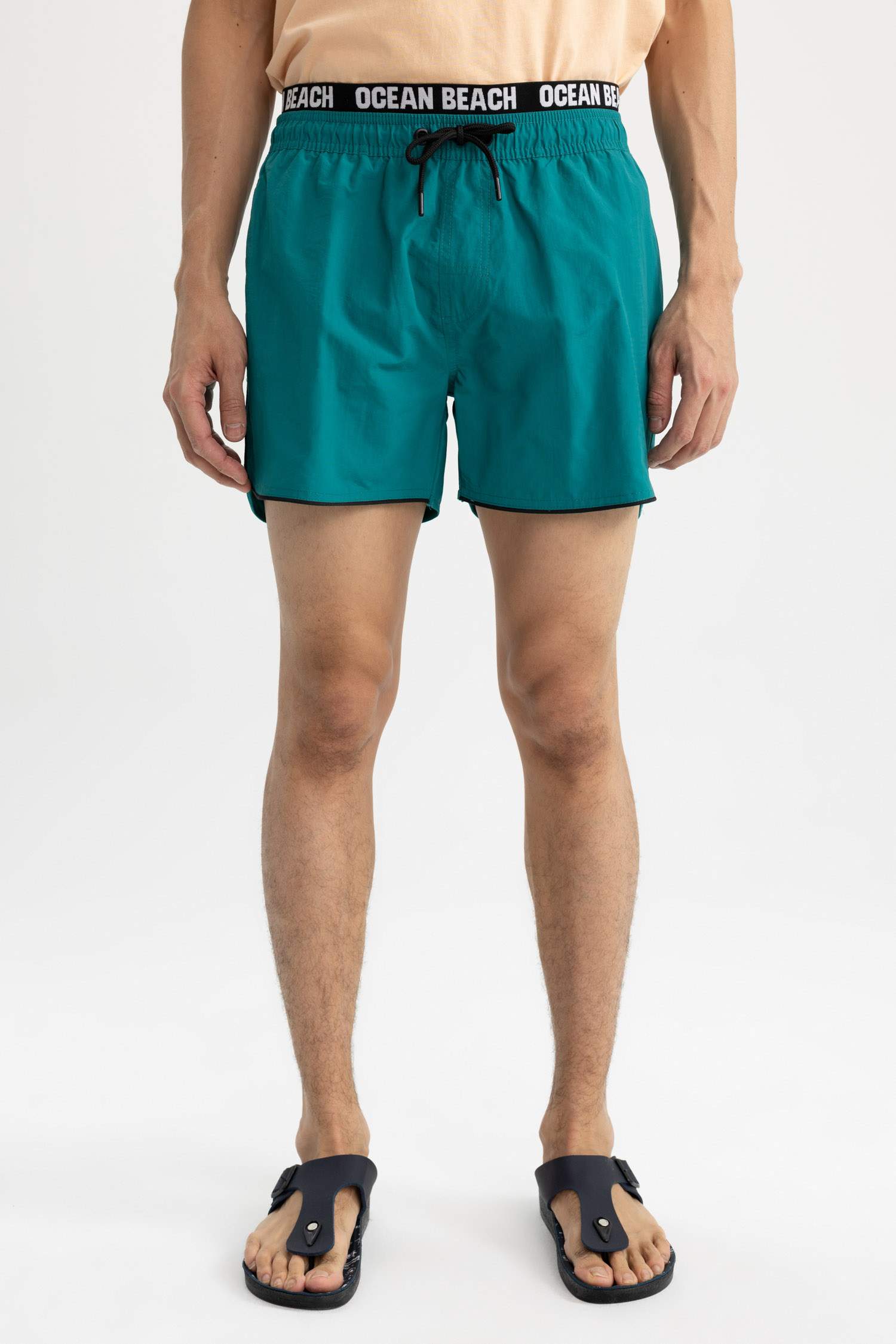 Тоқымалы жүзу шолақ шалбар энди басып шығарылған өте қысқа ұзындық