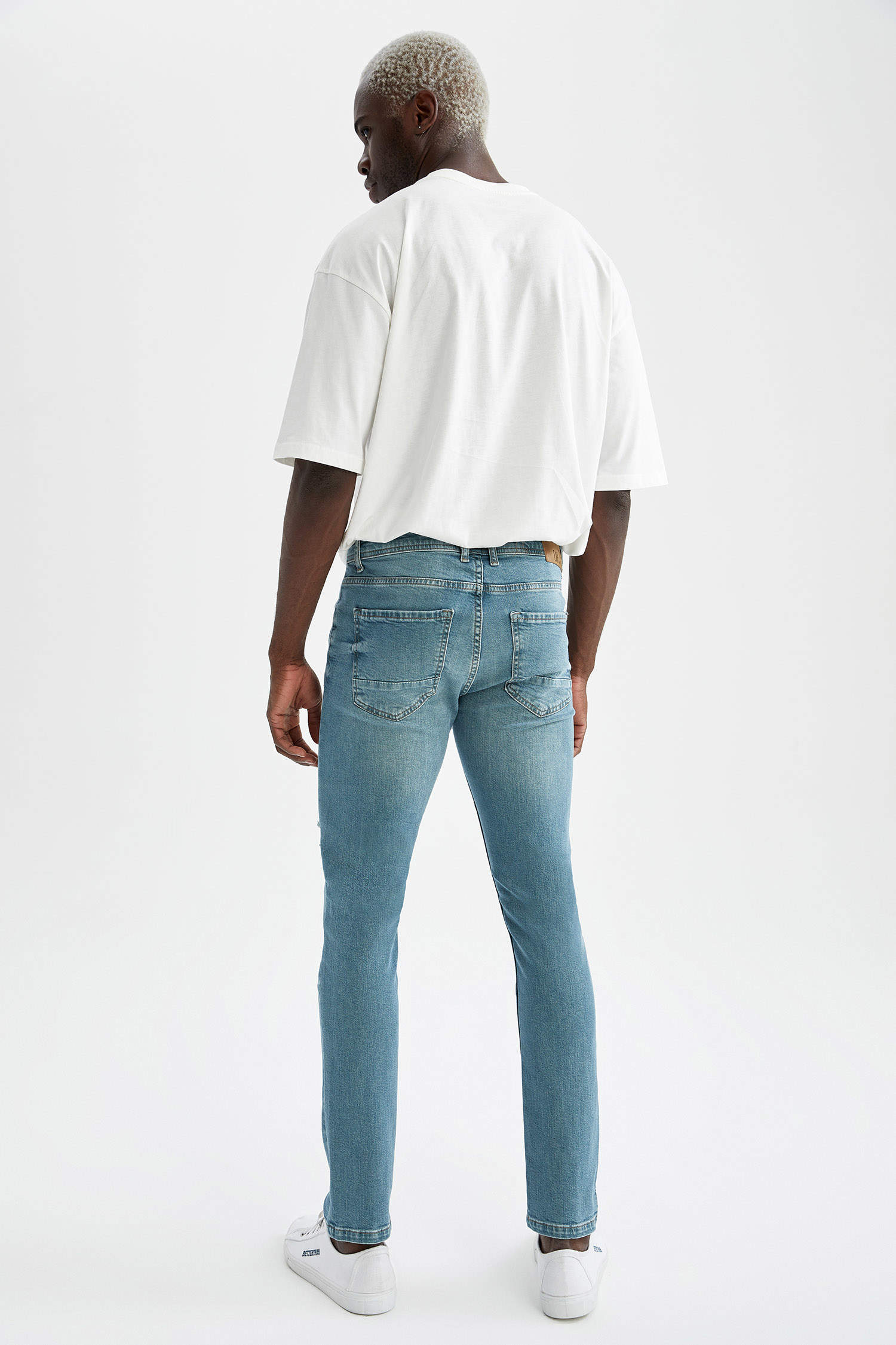 Defacto Skinny Fit Normal Bel Dar Paça Yırtık Detaylı Jean Pantolon. 4
