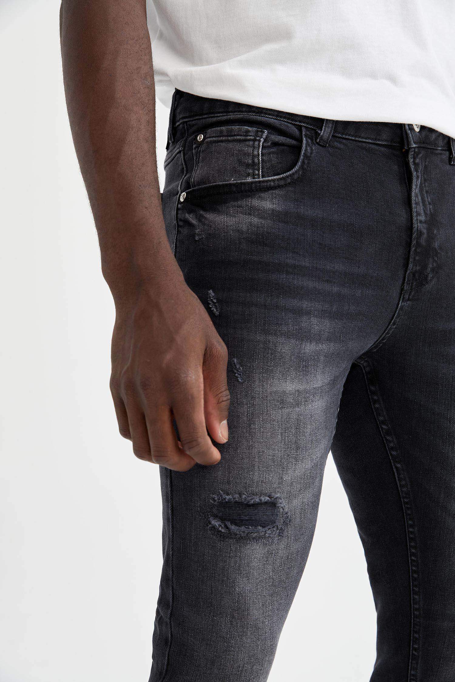 Defacto Skinny Comfort Fit Normal Bel Dar Paça Yırtık Detaylı Jean Pantolon. 4