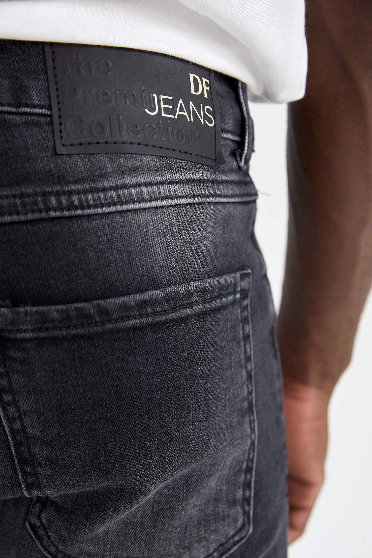 Defacto Skinny Comfort Fit Normal Bel Dar Paça Yırtık Detaylı Jean Pantolon. 5