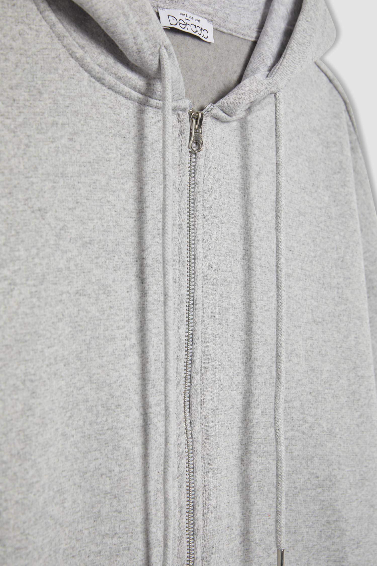 جاكيت قماش سميك اوفر سايز بغطاء للرأس