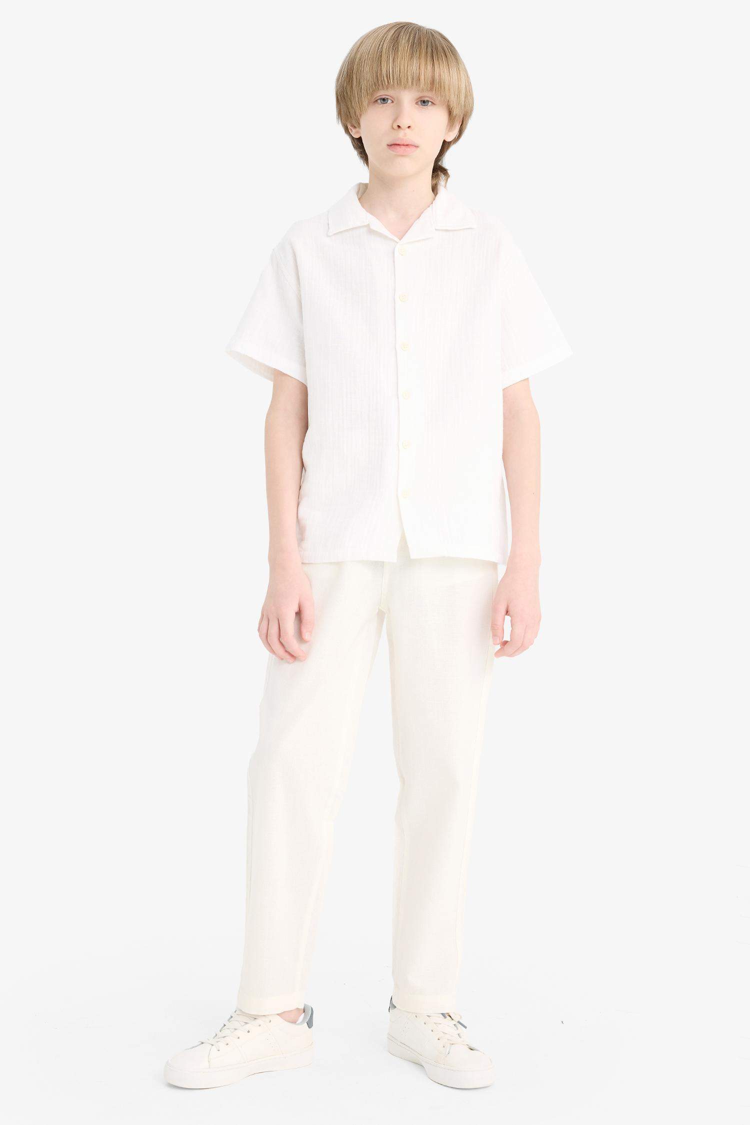 قميص بولو اولادي نص كم موسلين اوفر سايز