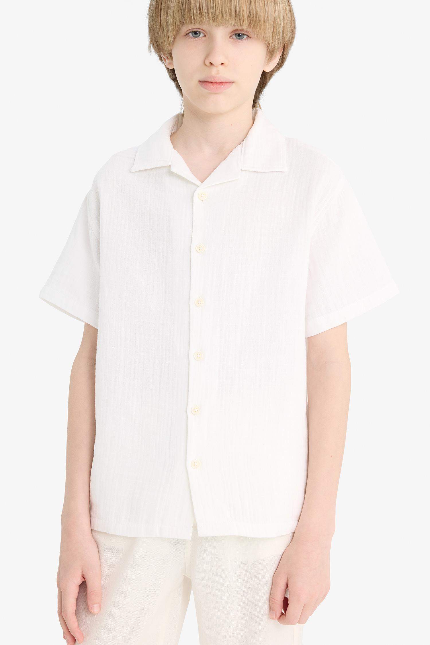 قميص بولو اولادي نص كم موسلين اوفر سايز