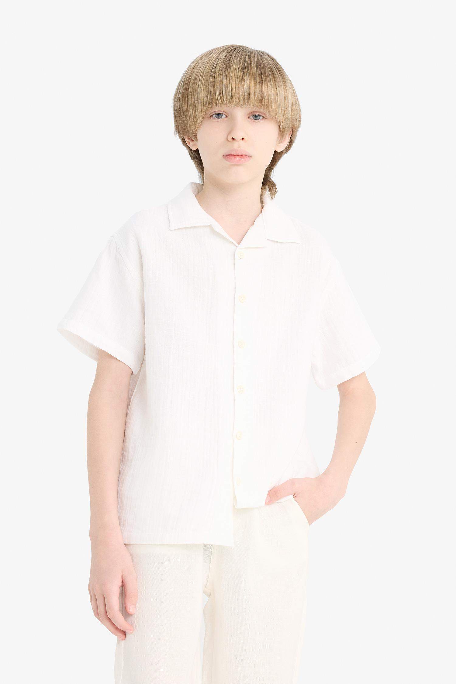 قميص بولو اولادي نص كم موسلين اوفر سايز