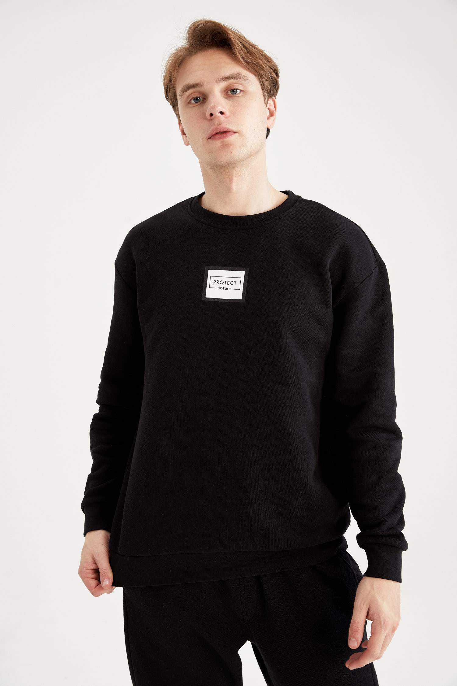 Black MEN Boxy Fit Long Sleeve Sweatshirt 2392798 | DeFacto