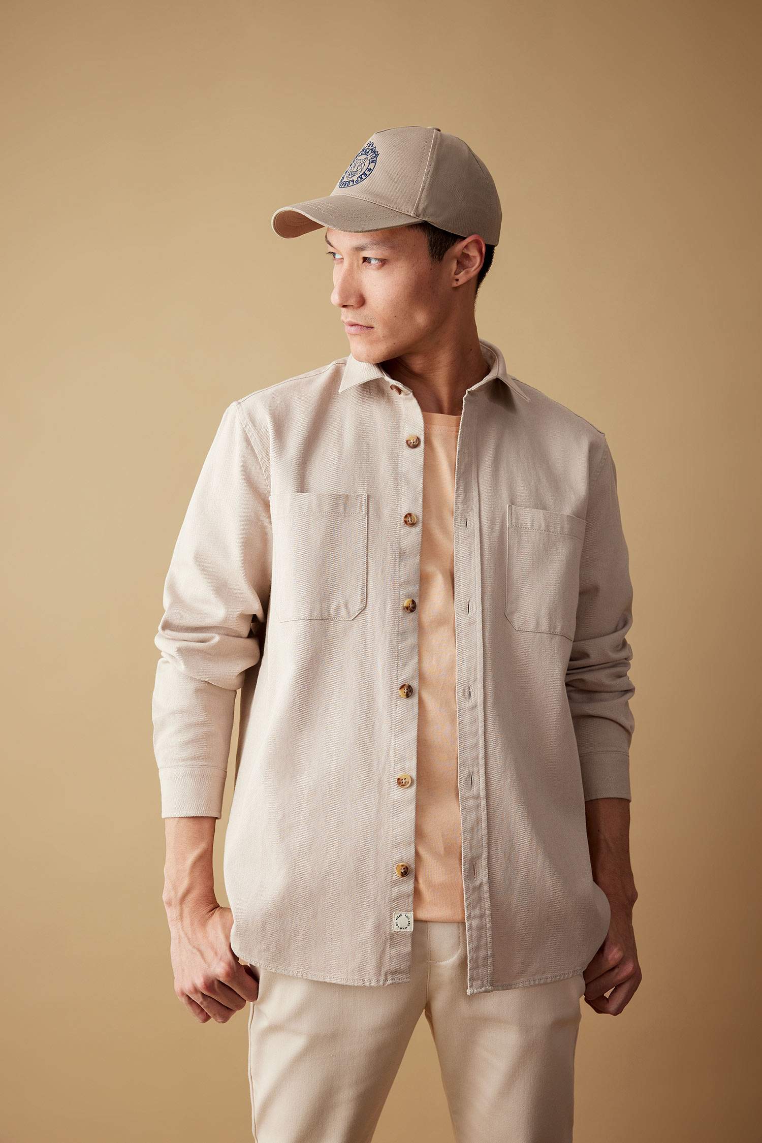 قميص بولو كم طويل قصة عادية