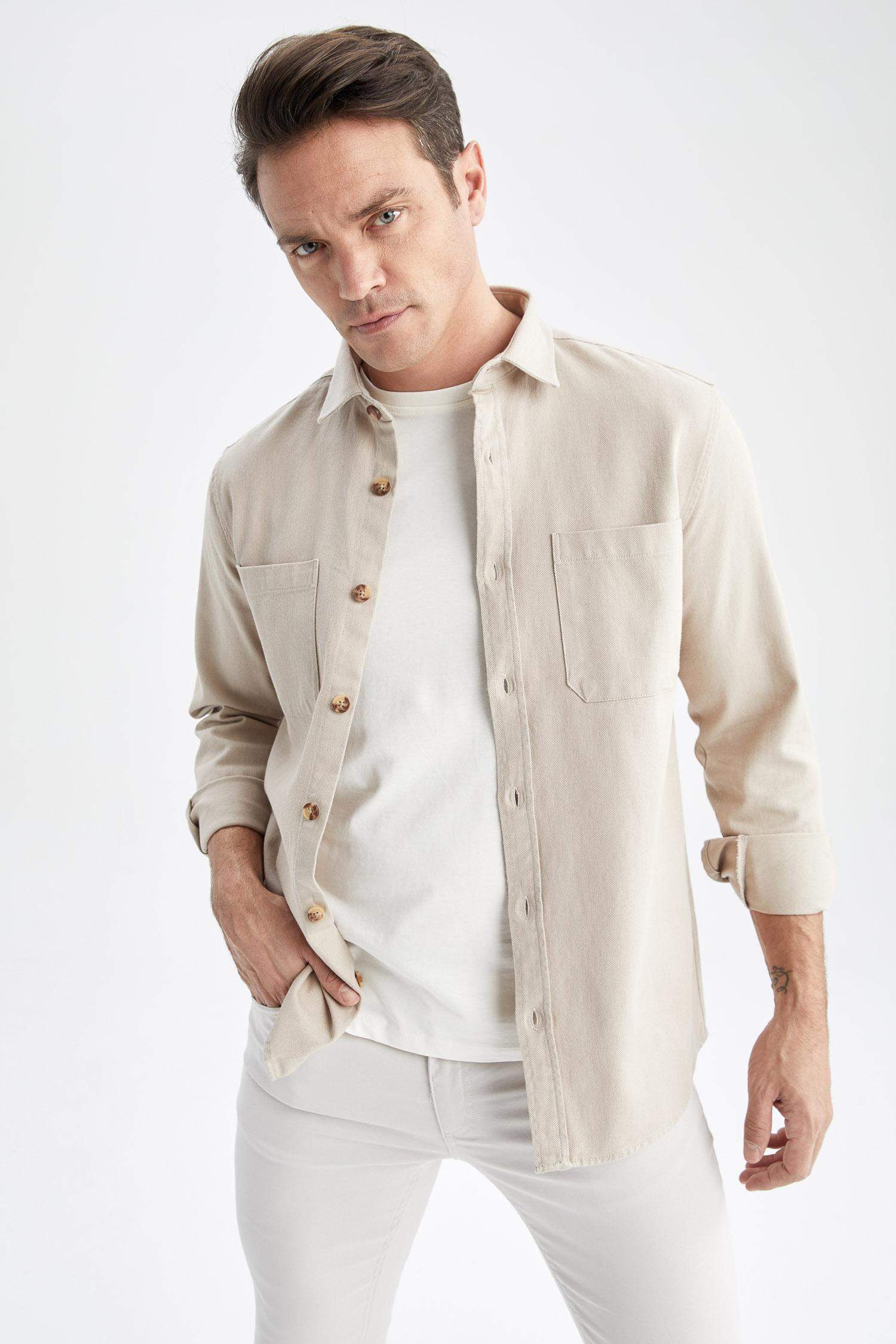 قميص بولو كم طويل قصة عادية