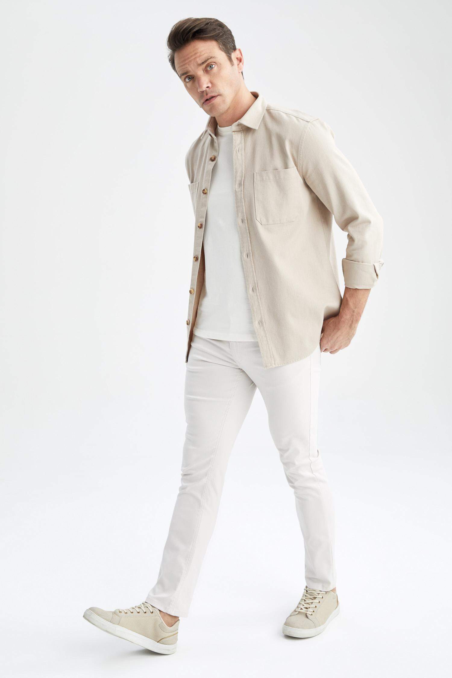 قميص بولو كم طويل قصة عادية