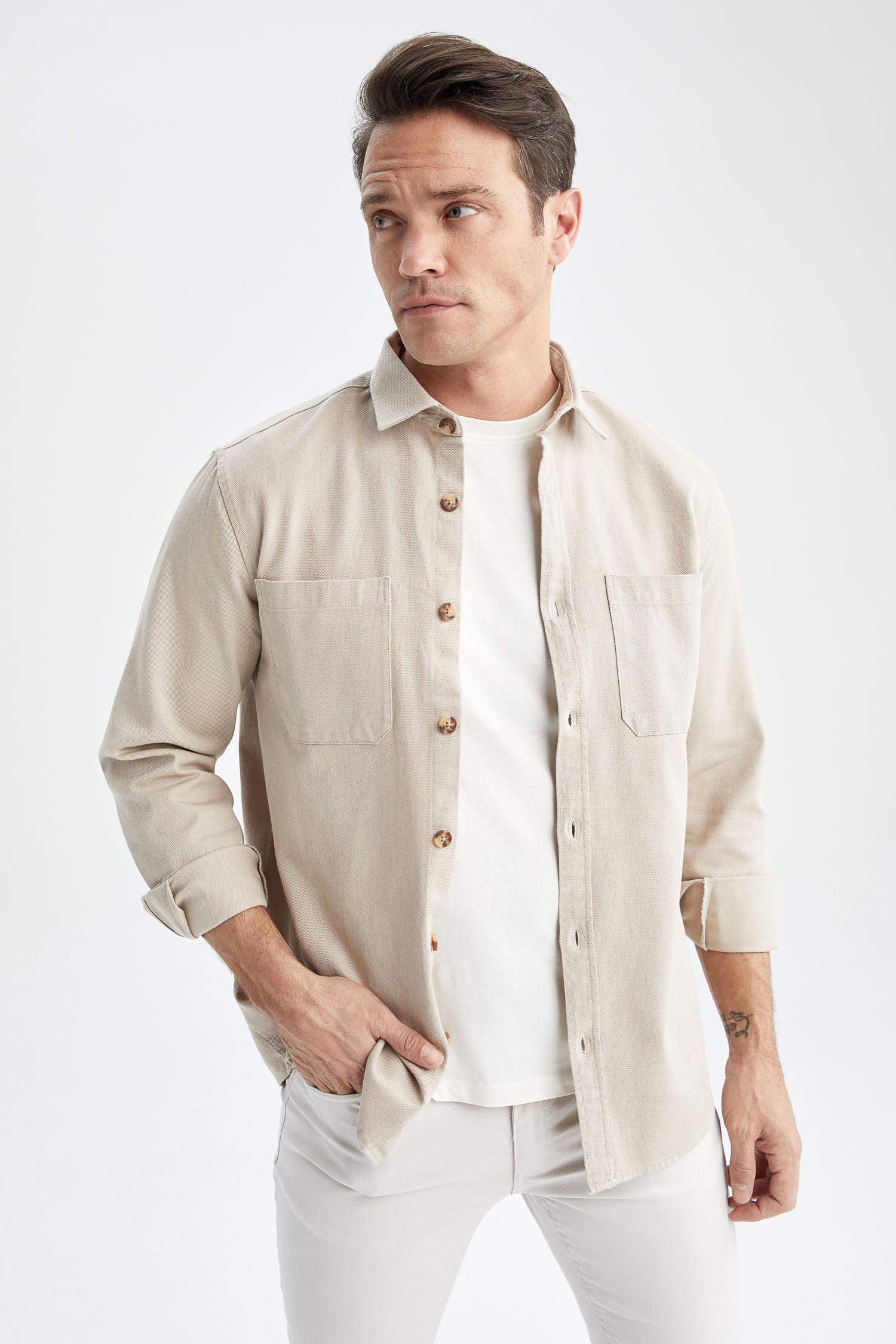 قميص بولو كم طويل قصة عادية