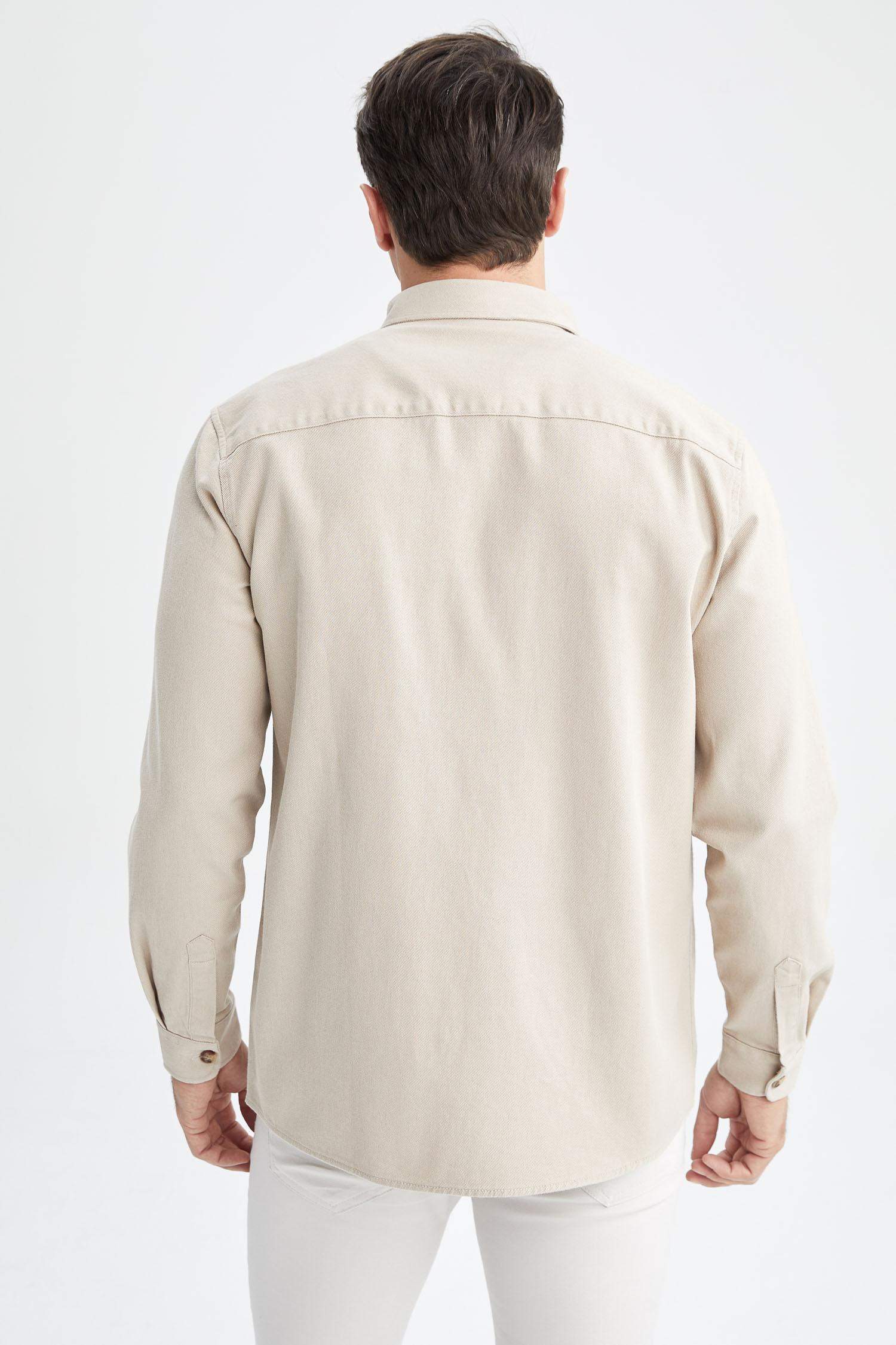 قميص بولو كم طويل قصة عادية